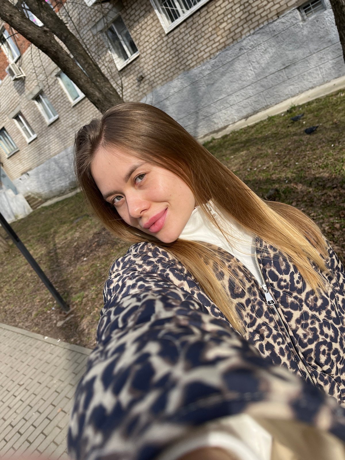 Woman in leopard jacket photographed around Chaikovsky, Russia