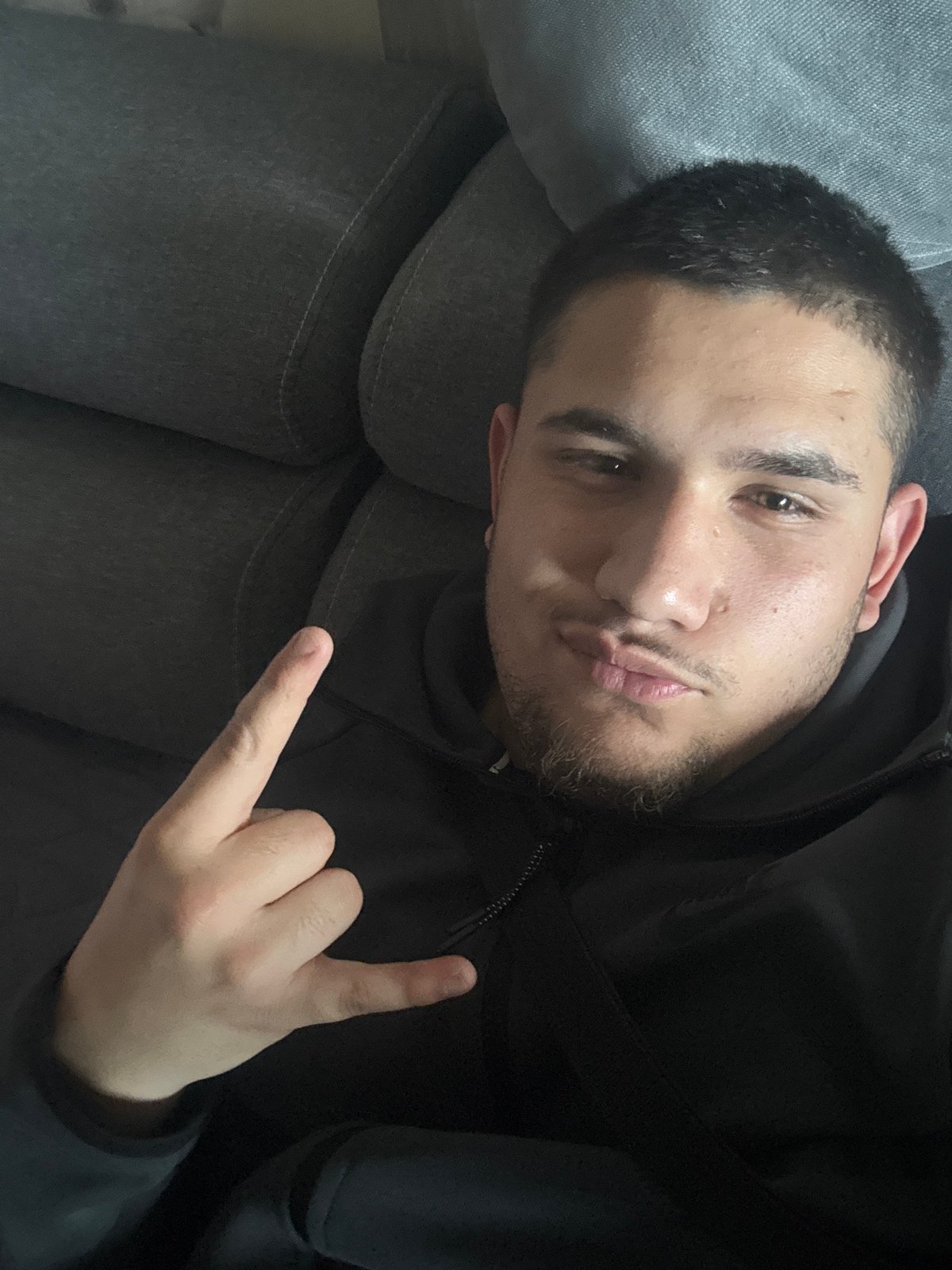 Young man takes selfies at home in Sofia