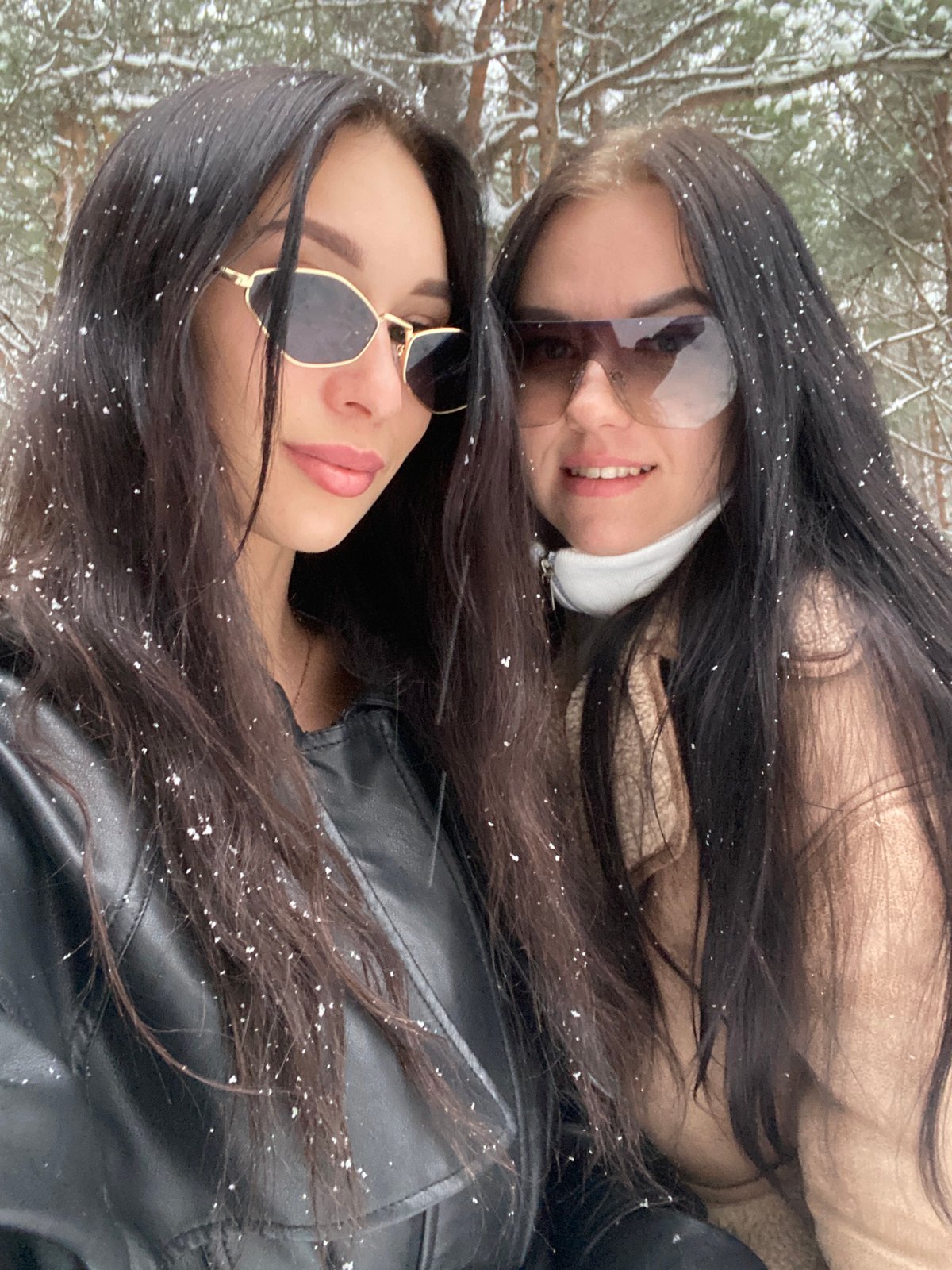 Spring snowfall brings families outdoors in Chaikovsky, Russia