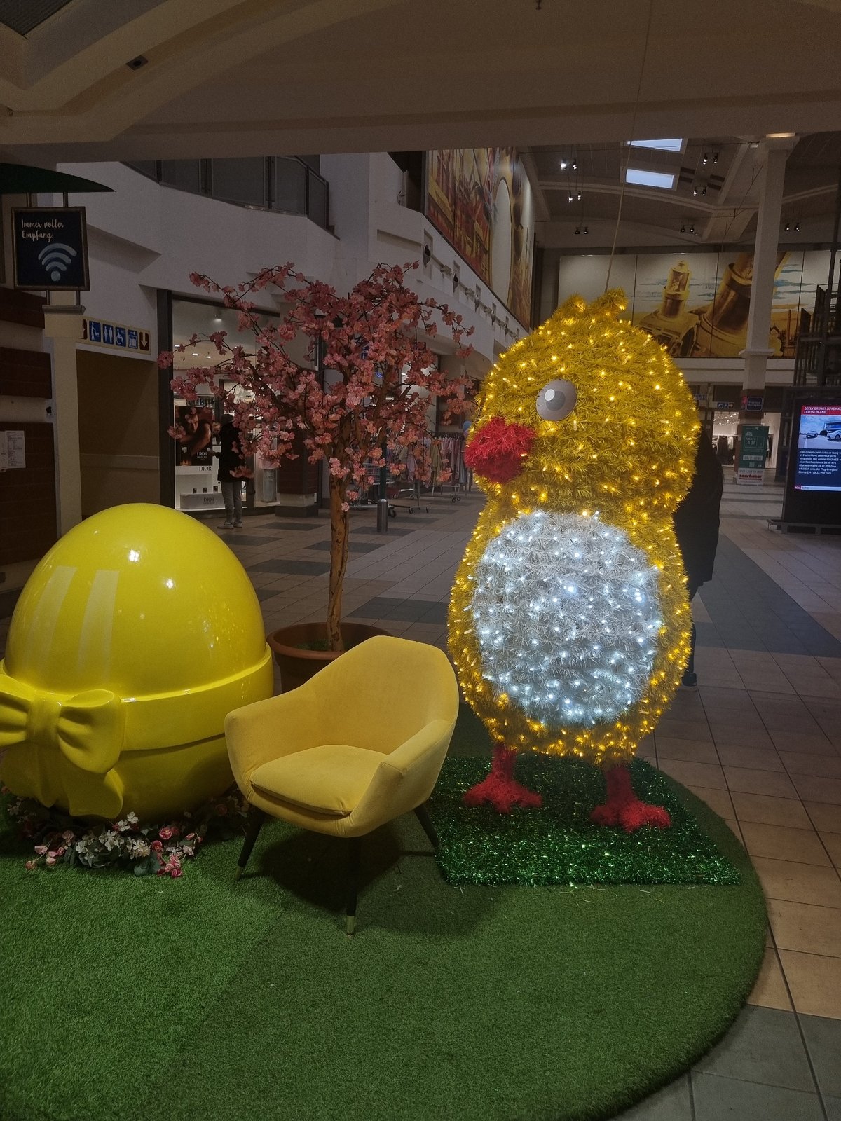 Easter light display features giant chick in Saarbrücken mall