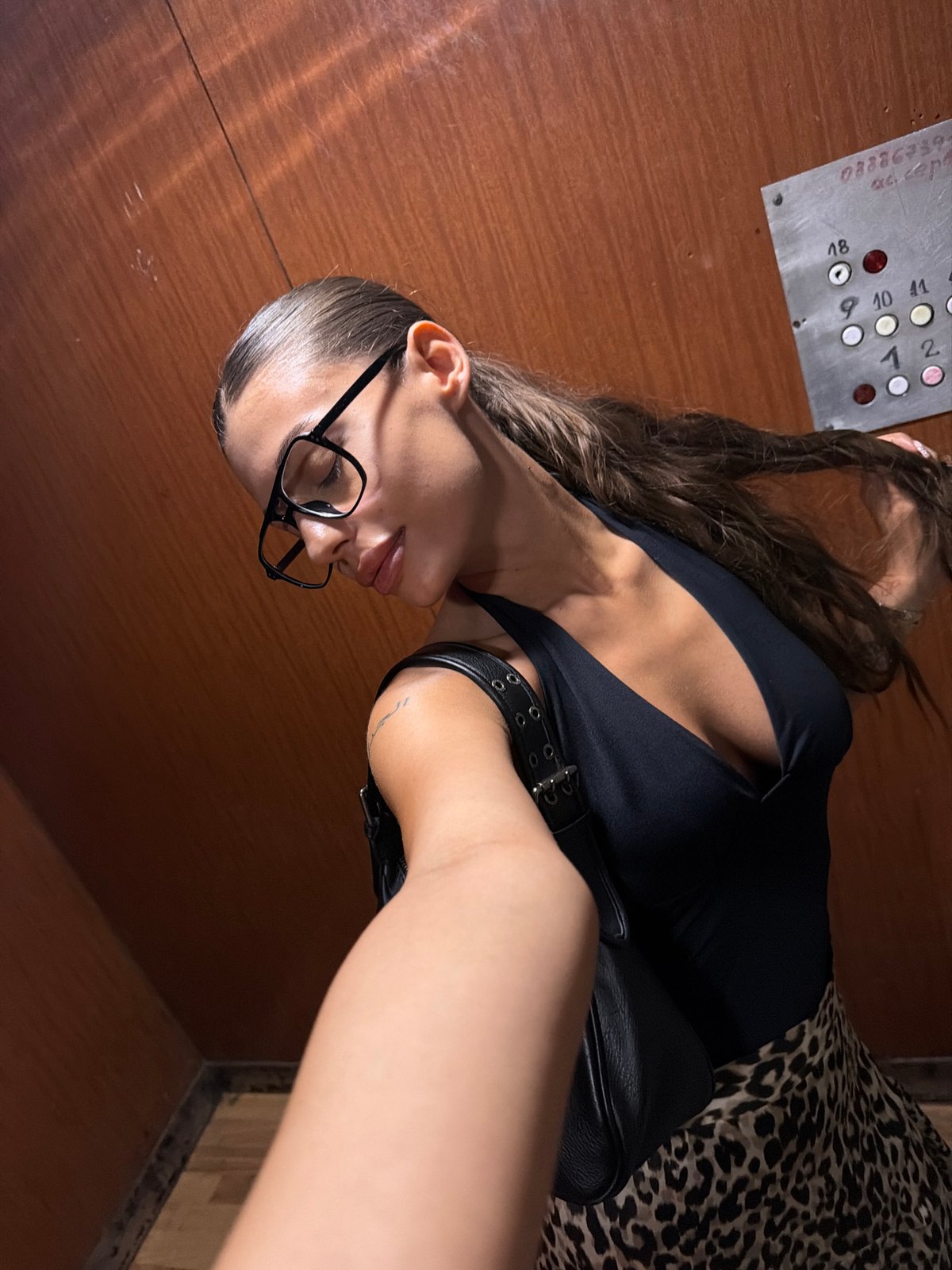 Mirror and elevator selfies in Burgas, leopard skirt on.