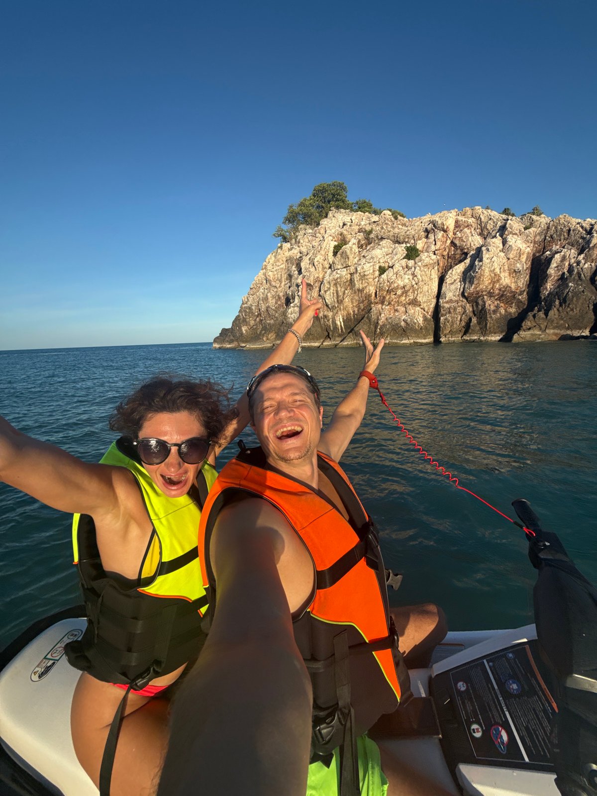 Jet skiing near rocky limestone islands off Choeng Mon