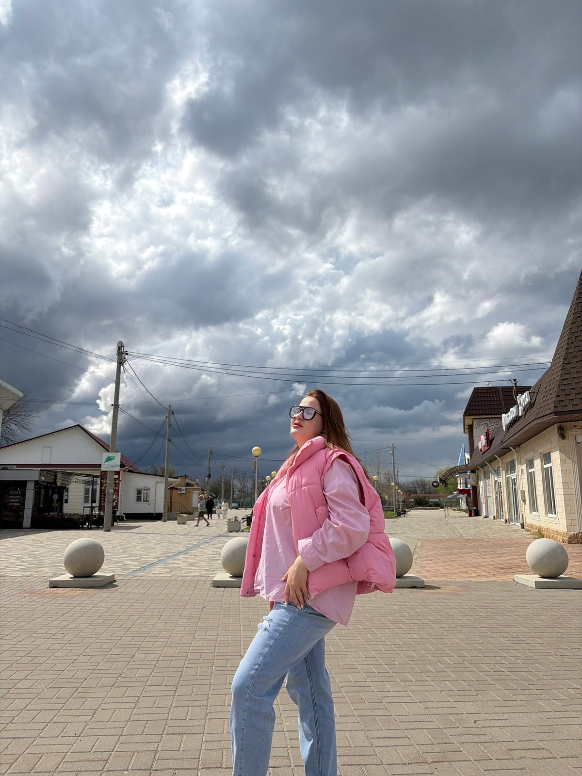 Everyday moments captured in Novopokrovskaya: selfies and rainbow skies