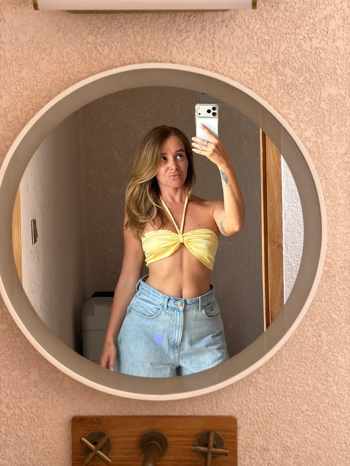 Mirror selfies around a Mengwi villa, same outfit, two rooms