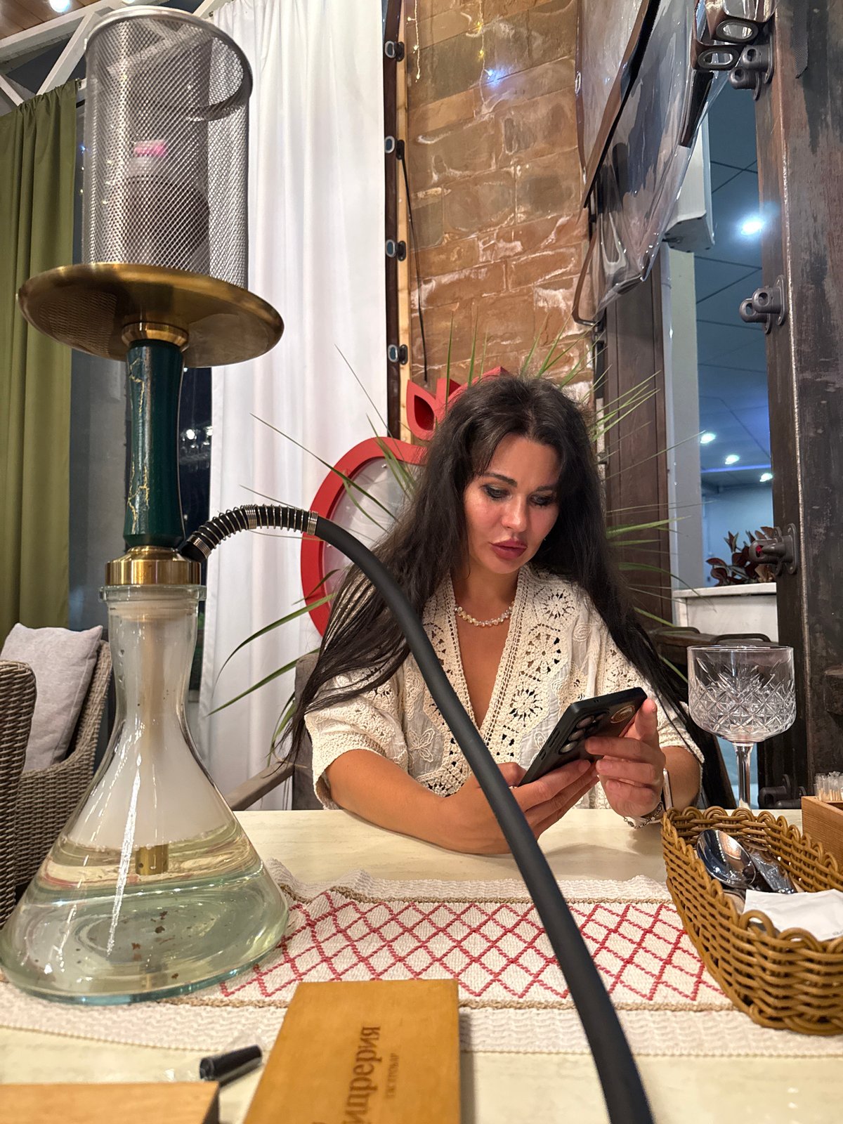 Hookah and drinks at a Sochi outdoor restaurant, summer evening