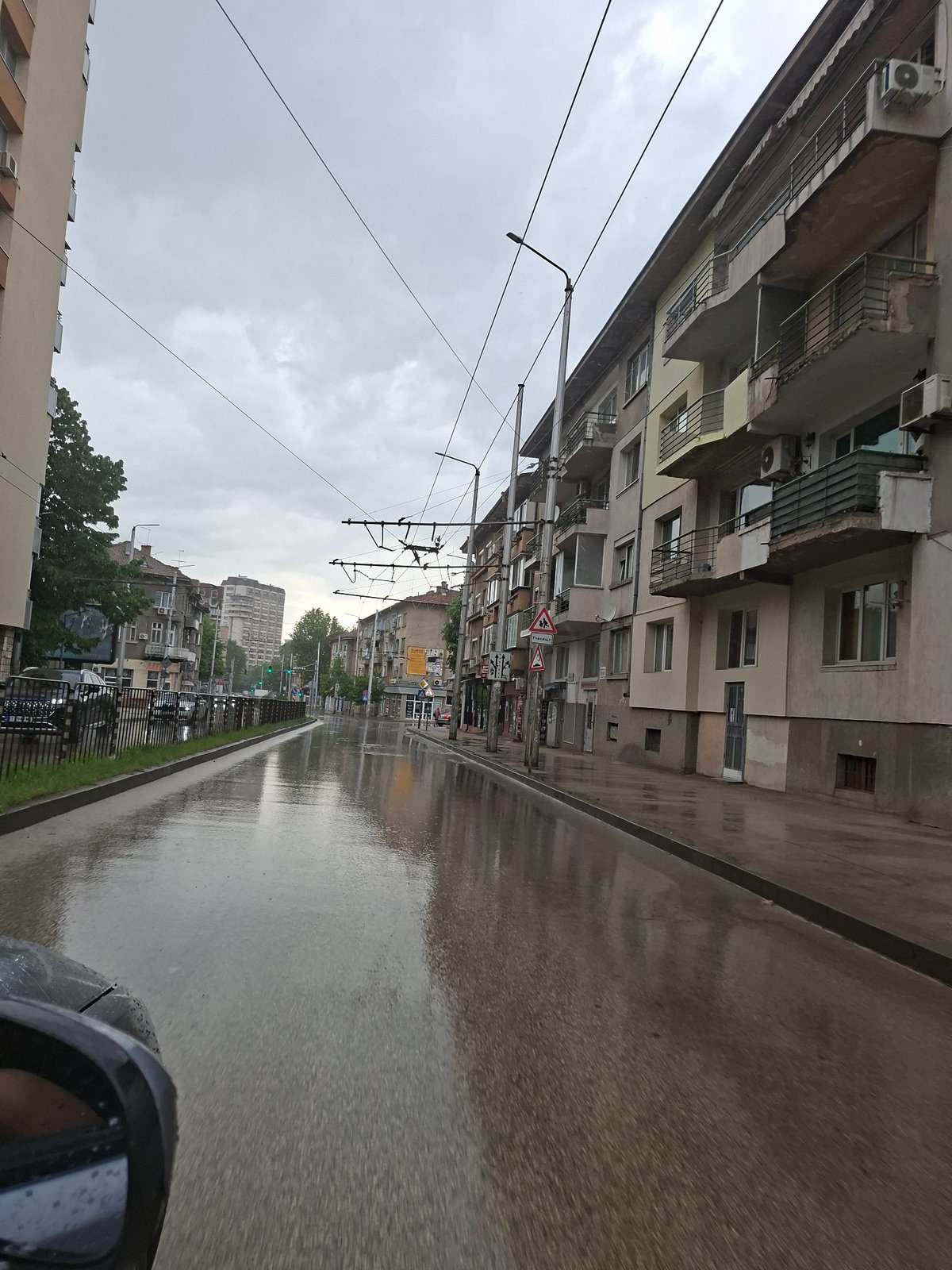 Rainy day captured on Pleven street with wet pavement
