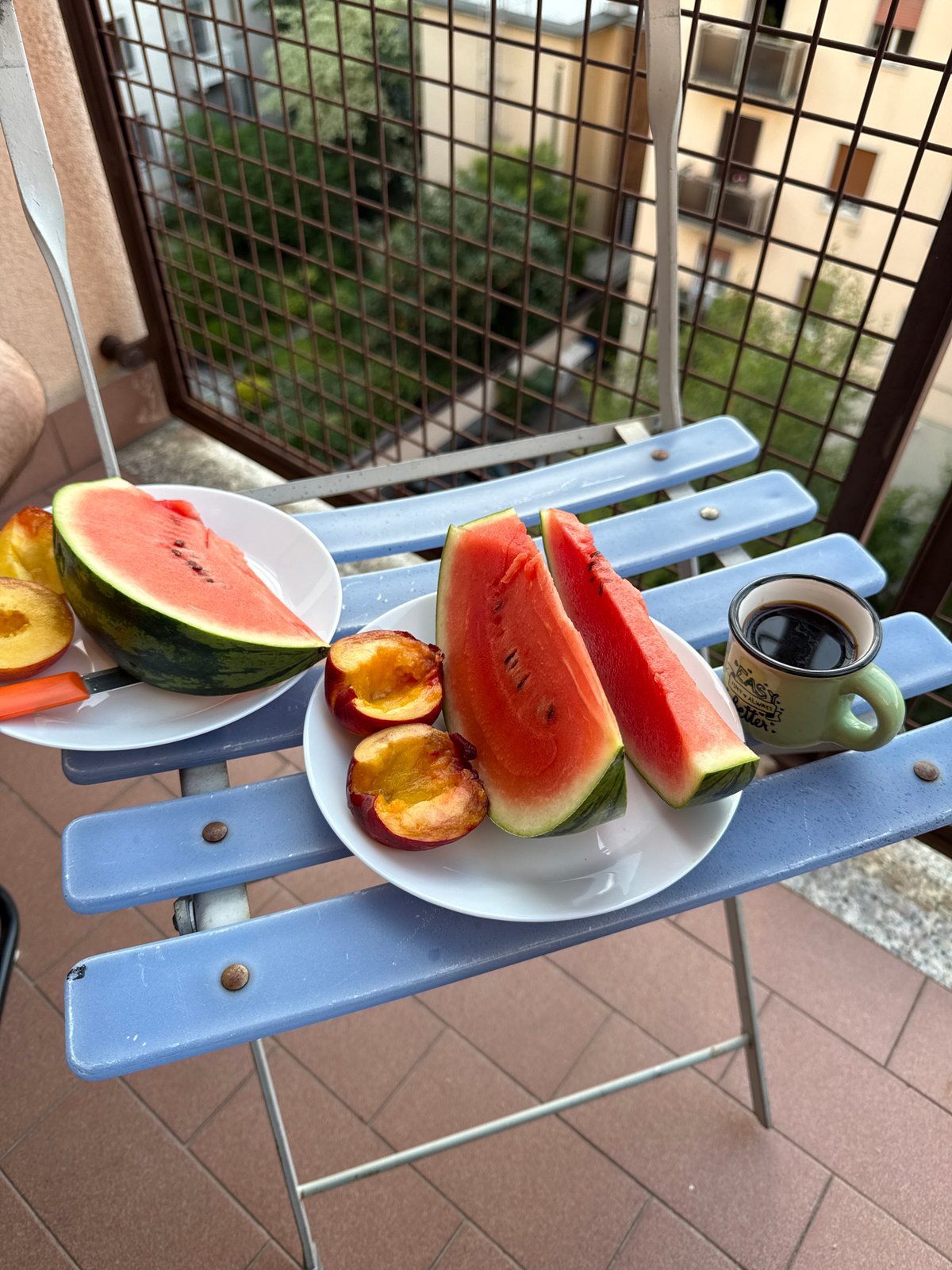 Summer fruit and coffee arranged on Milan balcony