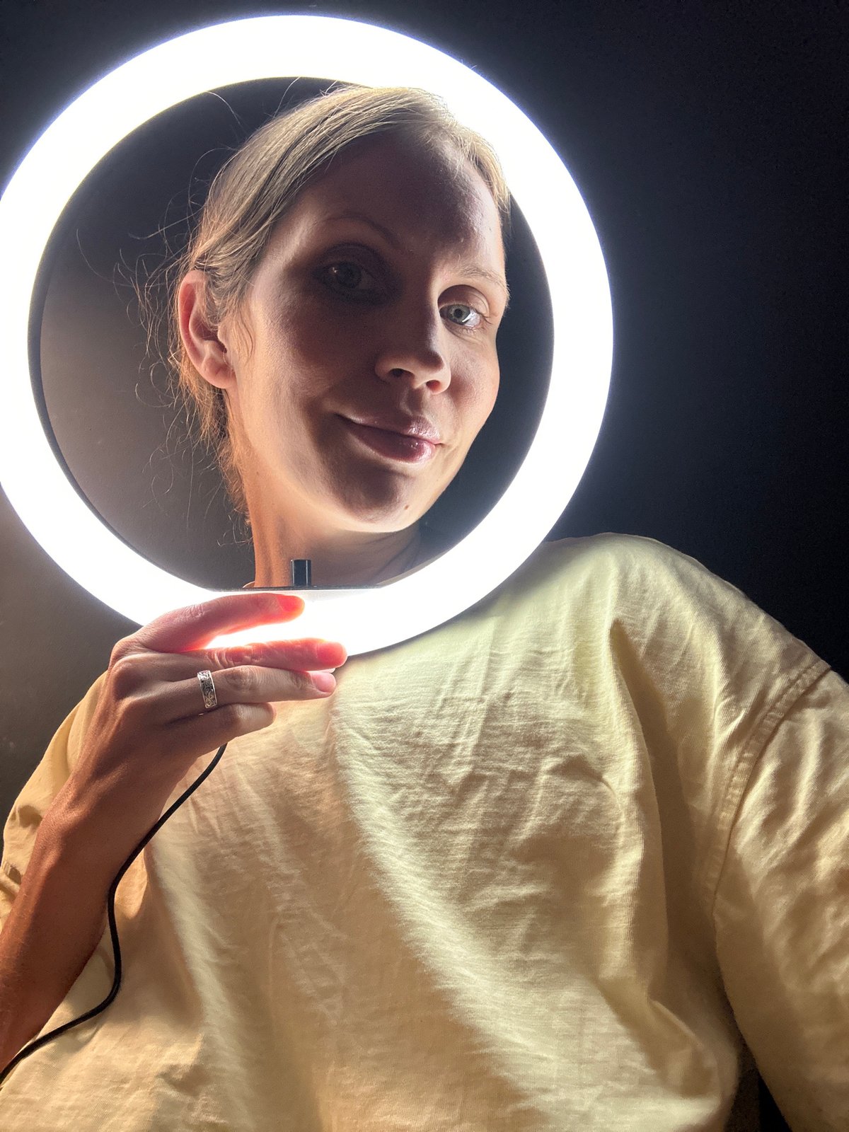 Woman experiments with ring light setup in Fethiye