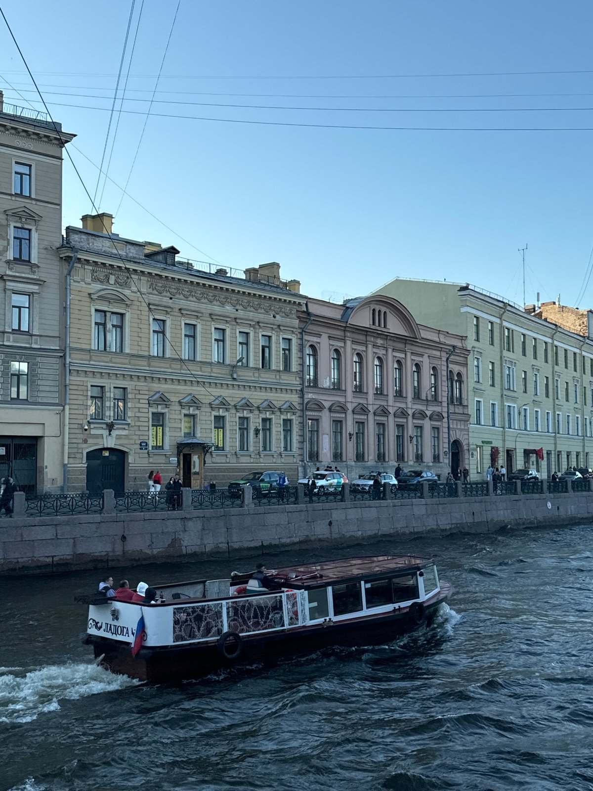 Saint Petersburg tourists, boats, street life captured near Kazan Cathedral