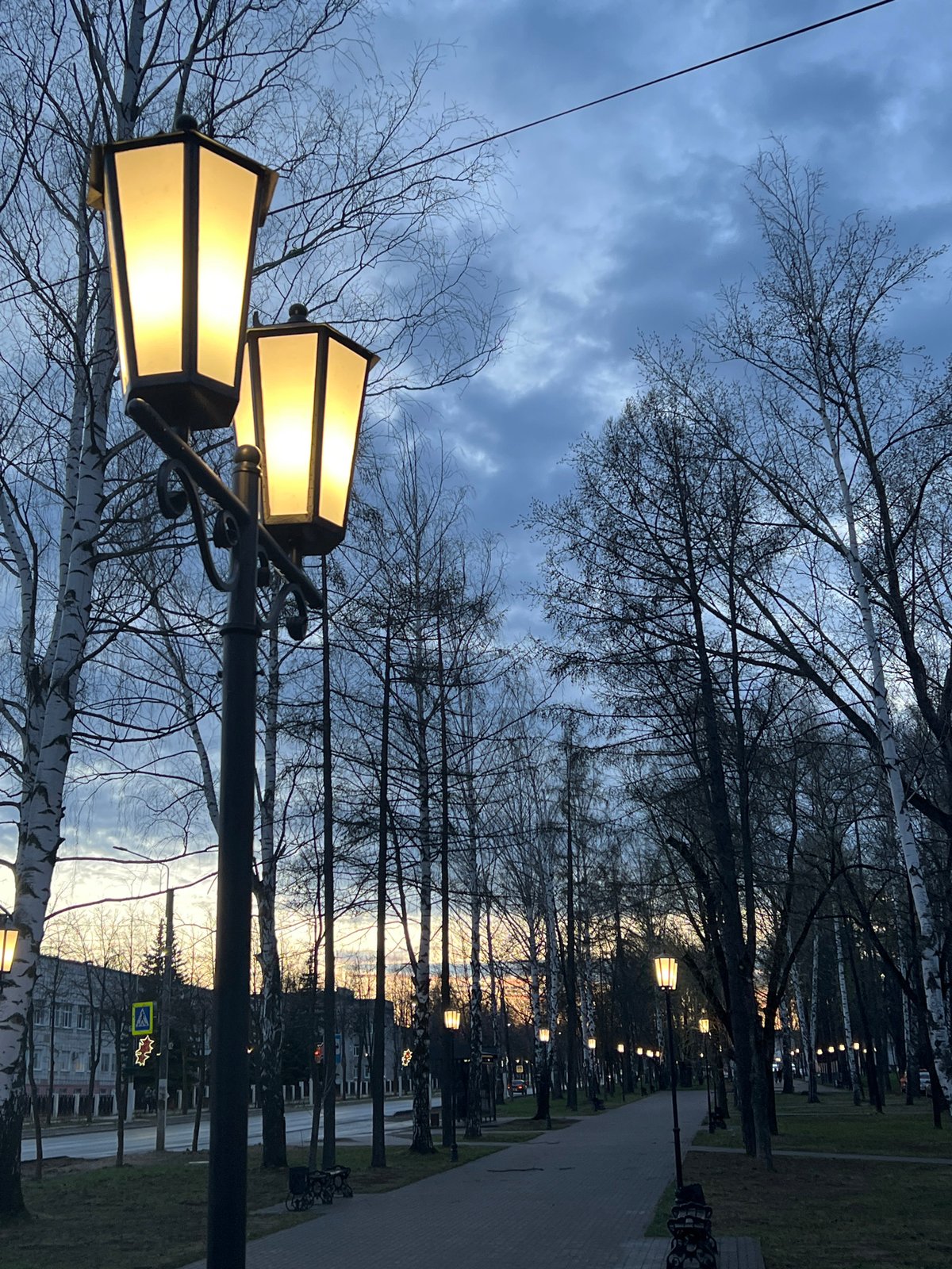 Evening moments captured in Chaikovsky park with woman, child