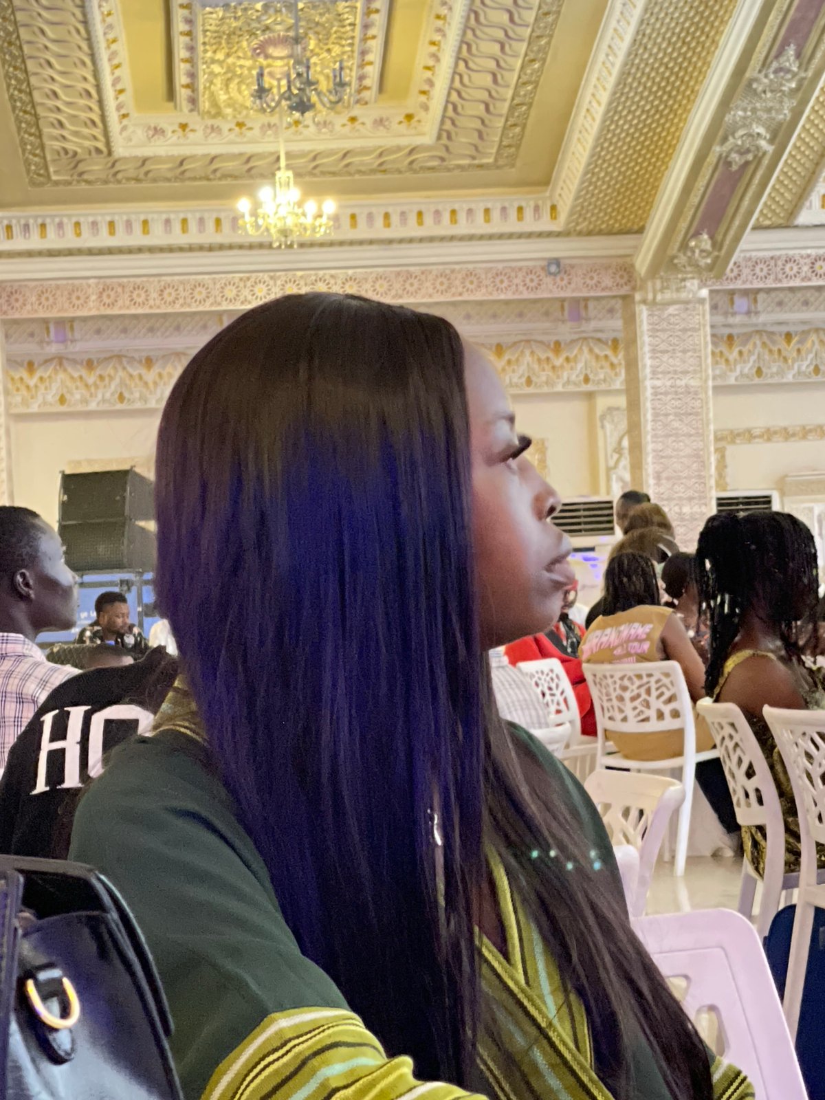 Gathering at an ornate event hall in Jos, Nigeria