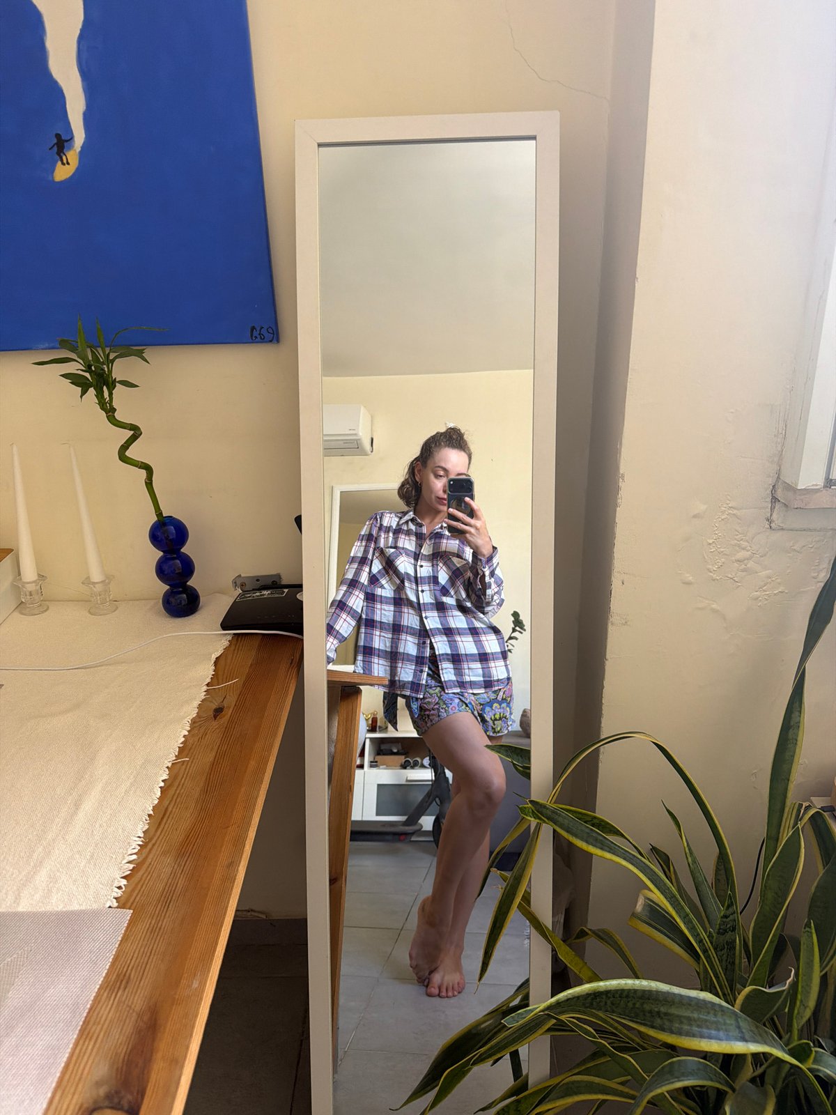 Mirror selfies in a Tel Aviv apartment, casual morning look
