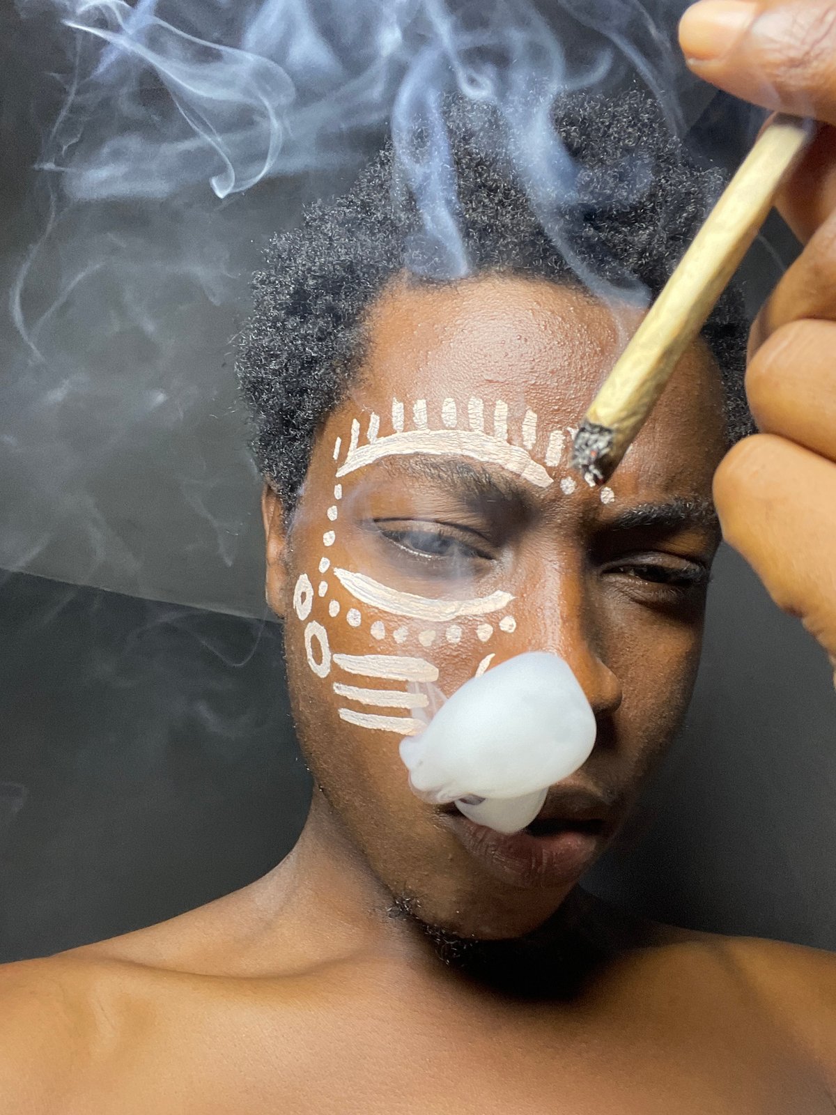 Styled portraits with face paint and smoke, Nkpor