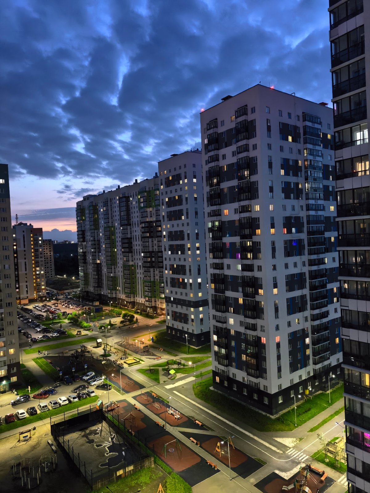 Residential complex documented at dusk with dog sighting