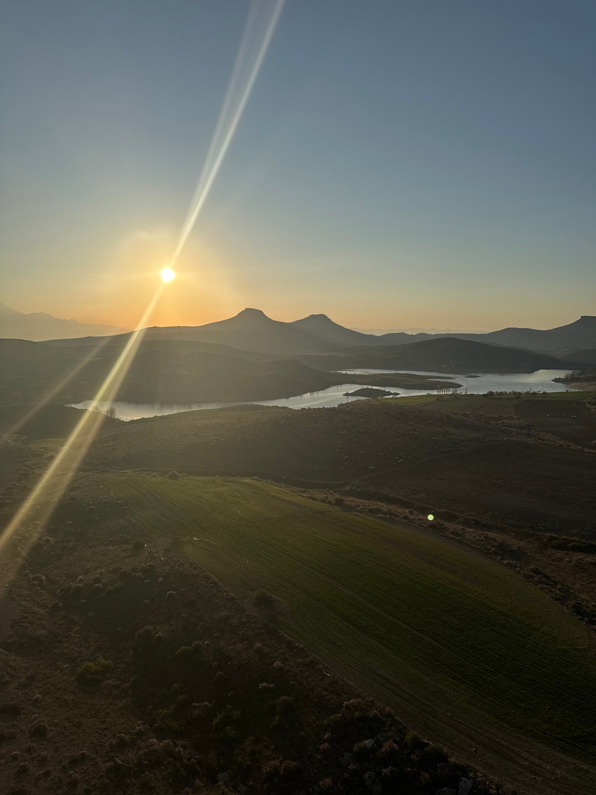 Sunrise captured over Turkish river valley near Yeşilhisar