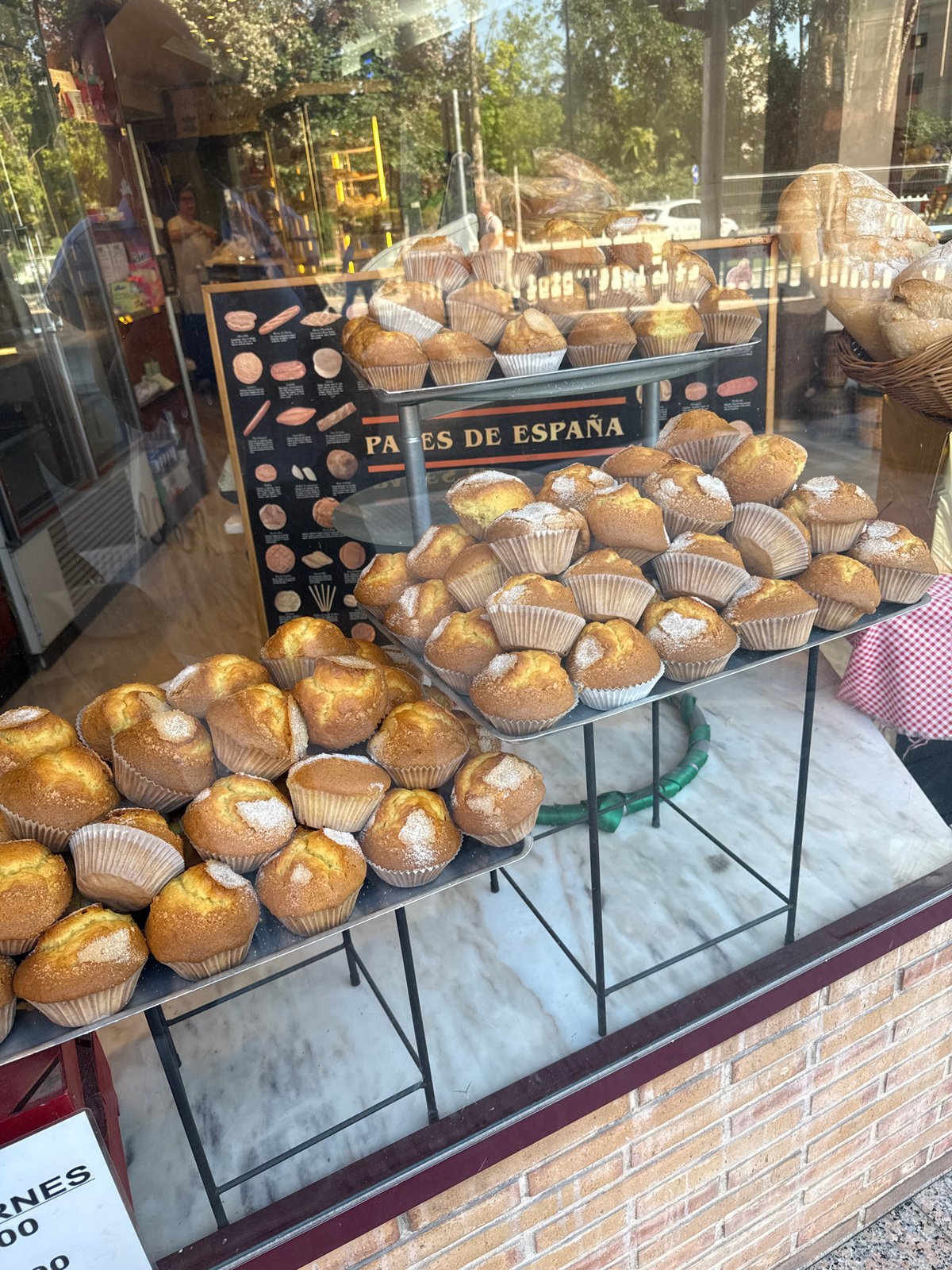 Morning scenes captured around commercial district with bakery, patio, street