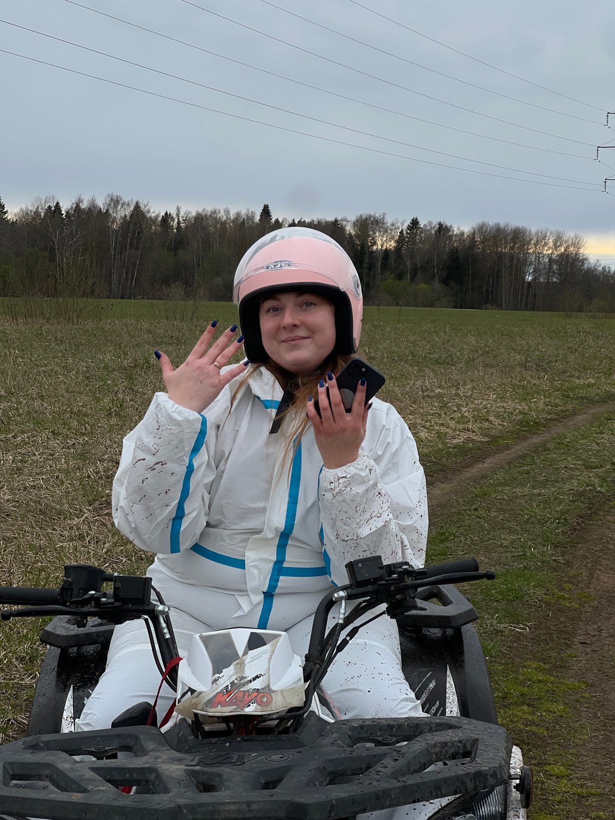 ATV rider in protective gear spotted in Russian field