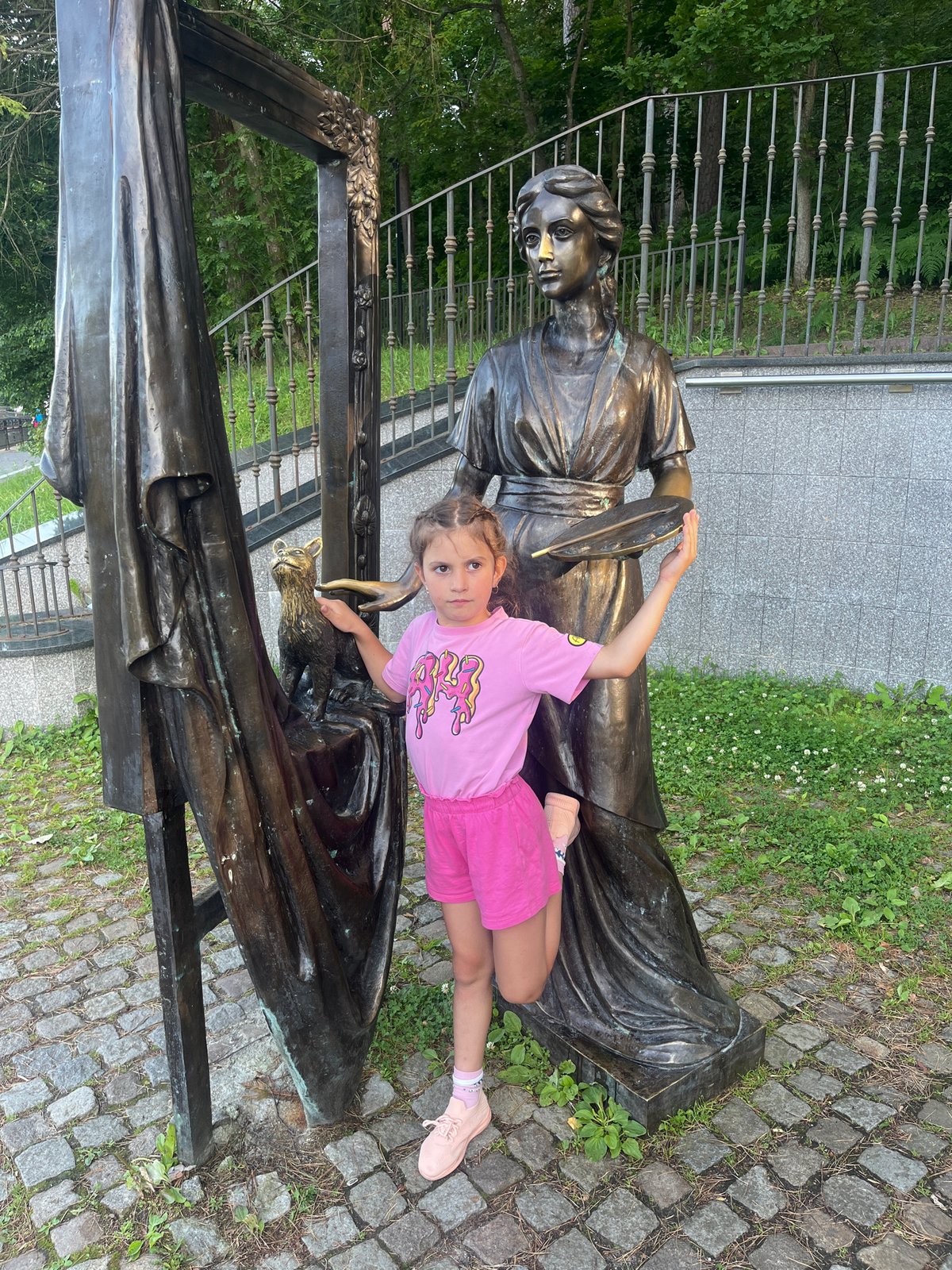 Bronze artist sculpture and figurines along a Svetlogorsk walkway