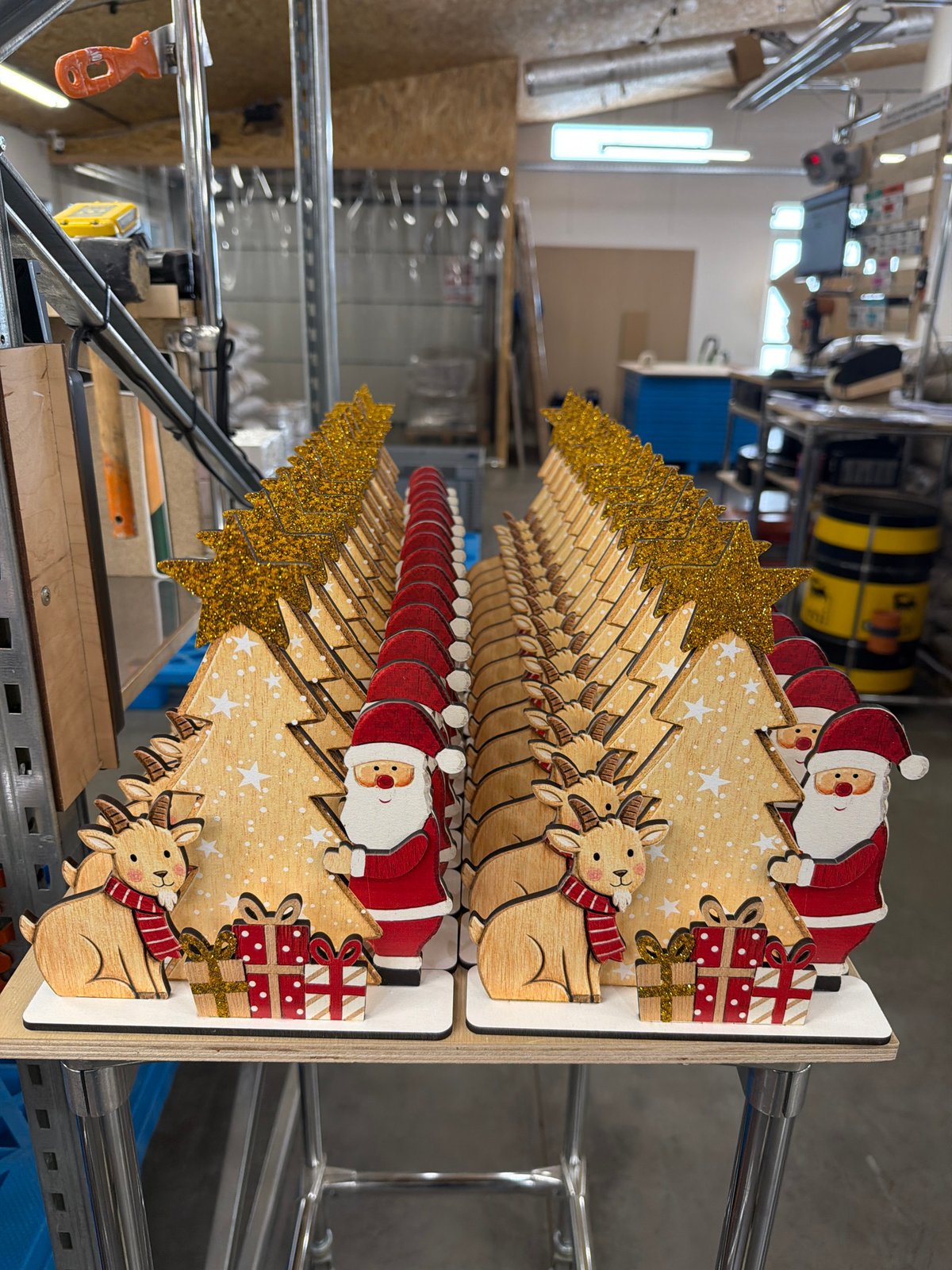 Warehouse session reviewing decorative cutouts across holiday and folk themes