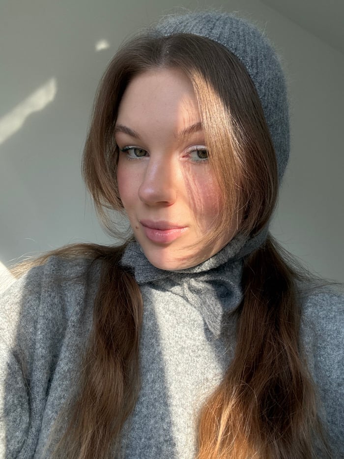 Woman documents morning makeup routine in Belgrade's Vozdovac district