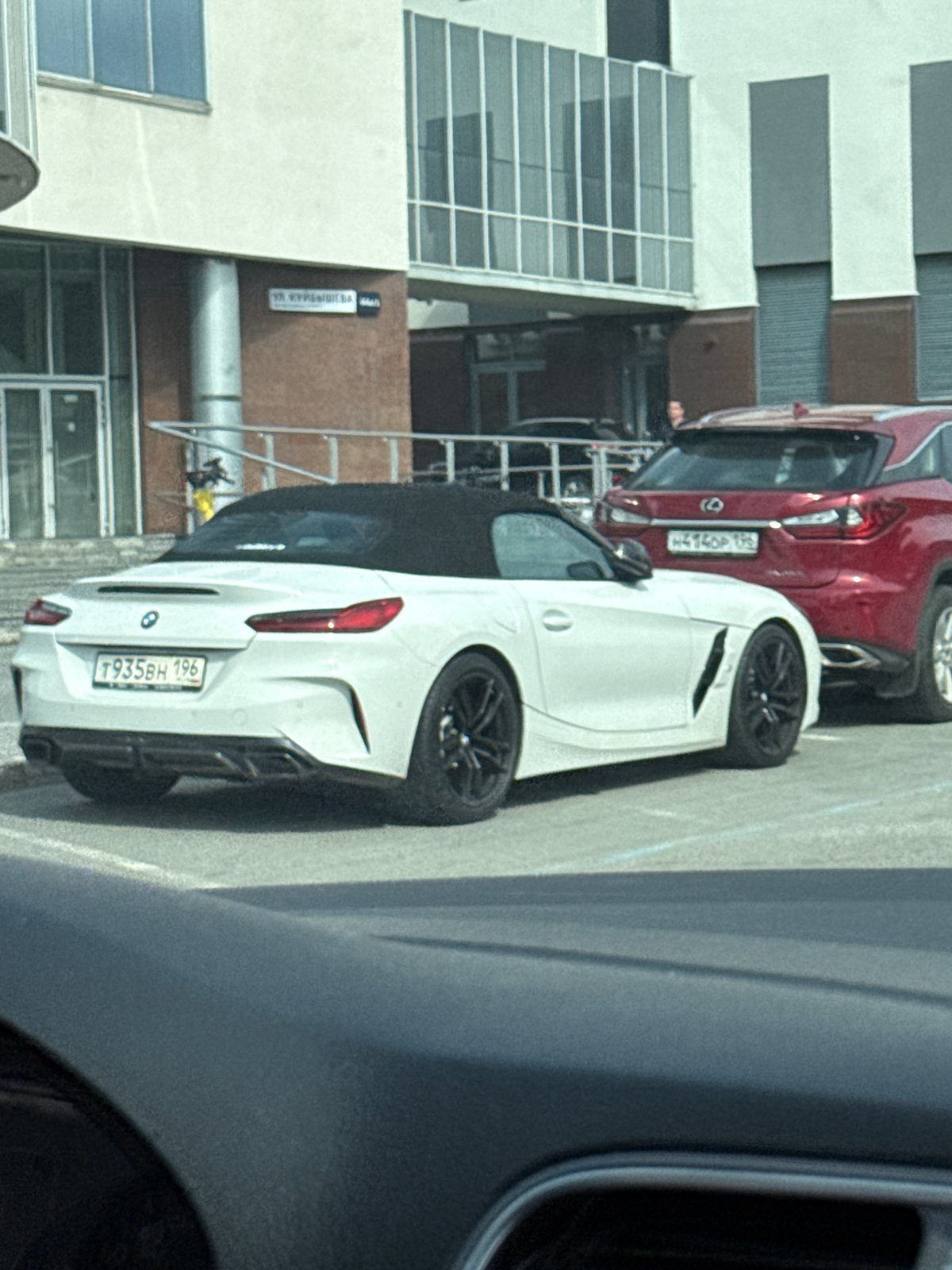 BMW Z4 and Lexus RX parked near Kuibyshev Street, Yekaterinburg