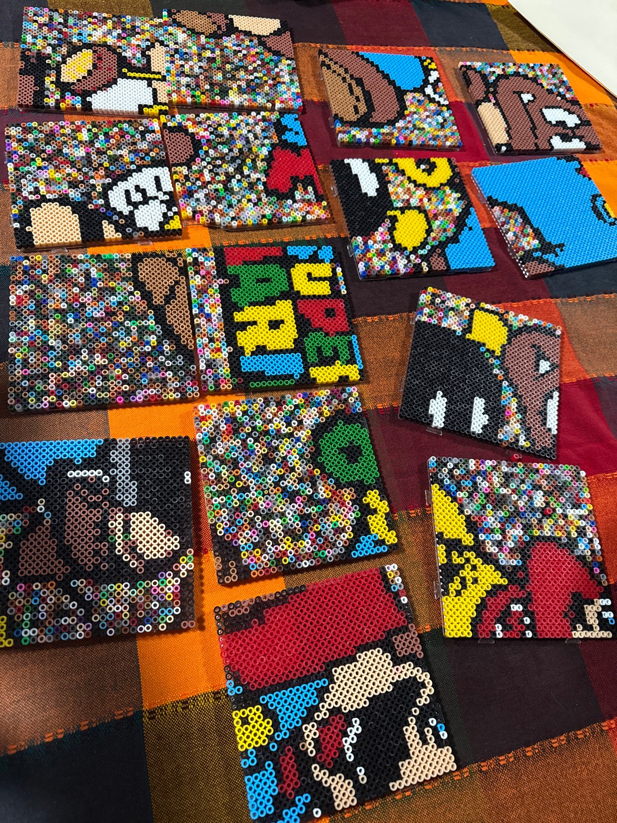 Handmade bead art featuring video game characters displayed in Puebla