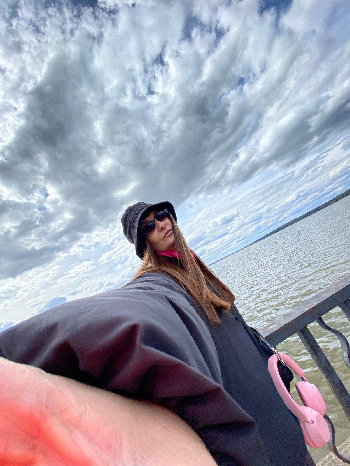 Women document casual waterfront visit in Votkinsk, Russia