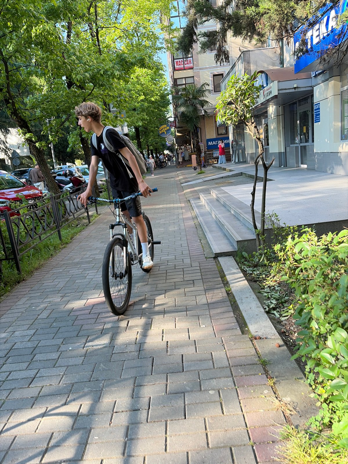 Afternoon scenes documented across Sochi parks, markets, and riverfront