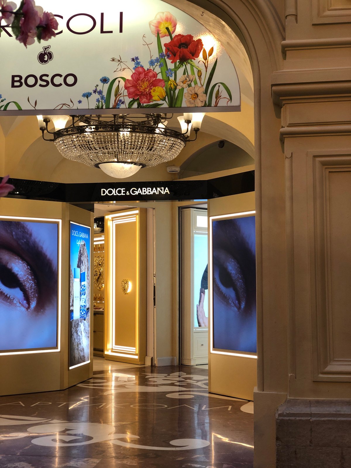 GUM department store scenes include luxury shopping, aerial performance