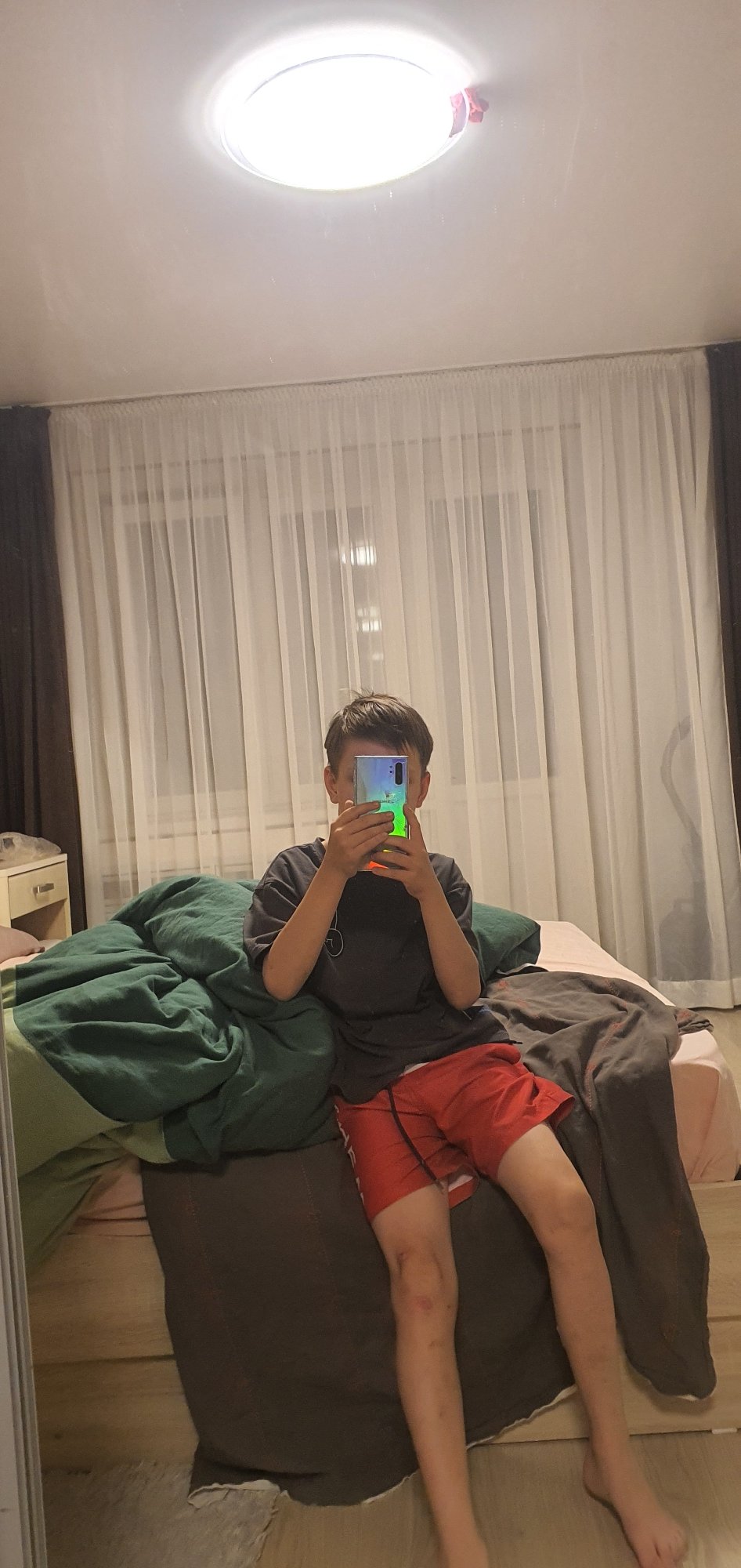 Multiple individuals documented in evening scenes across Chaikovsky, Russia