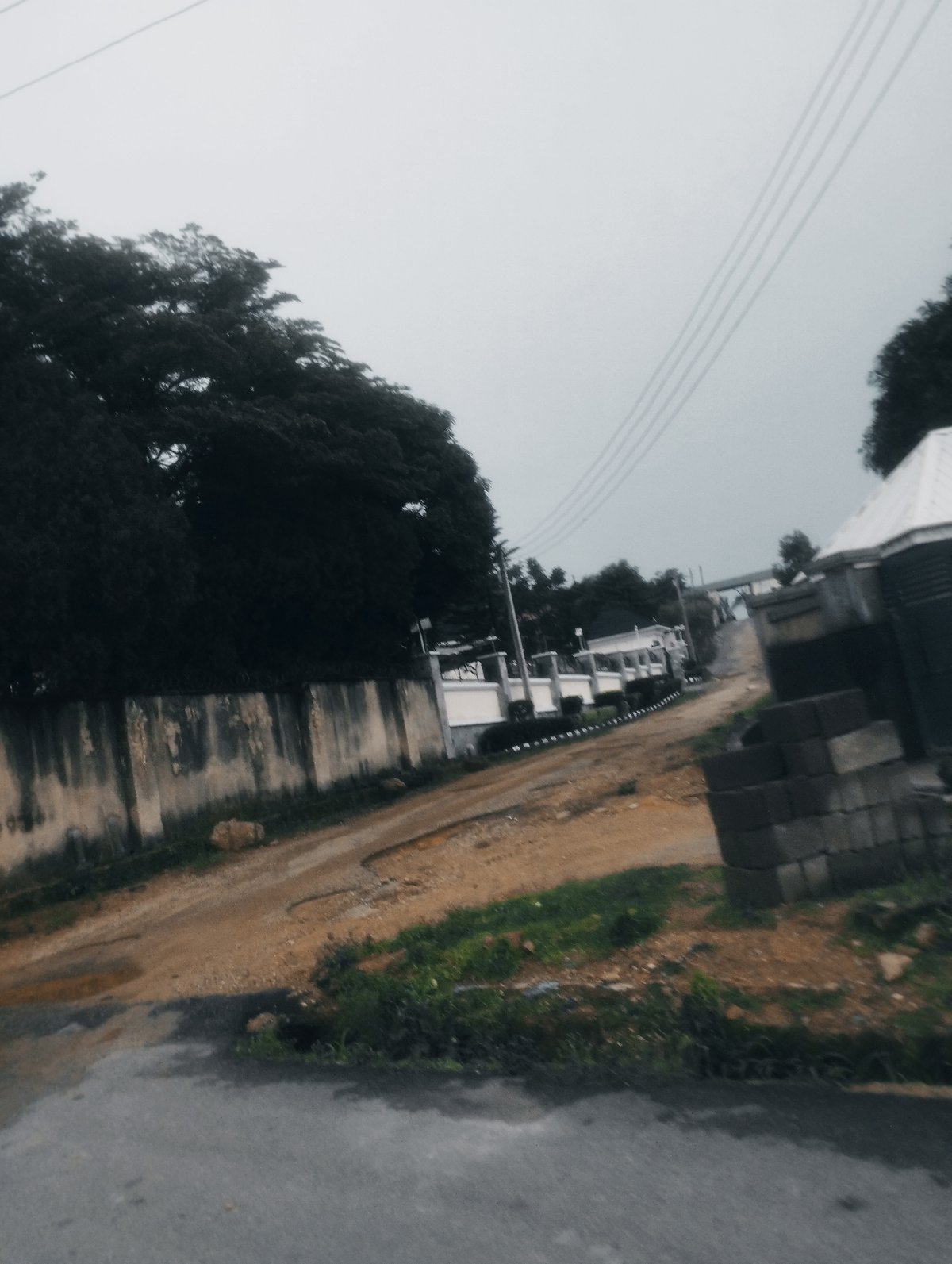 Residential walk through Jos, Nigeria on overcast afternoon