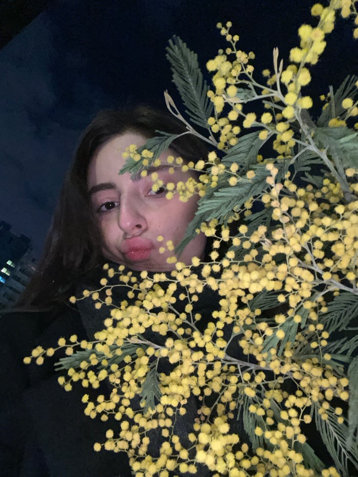 Young woman captures evening moments across Moscow through selfie series