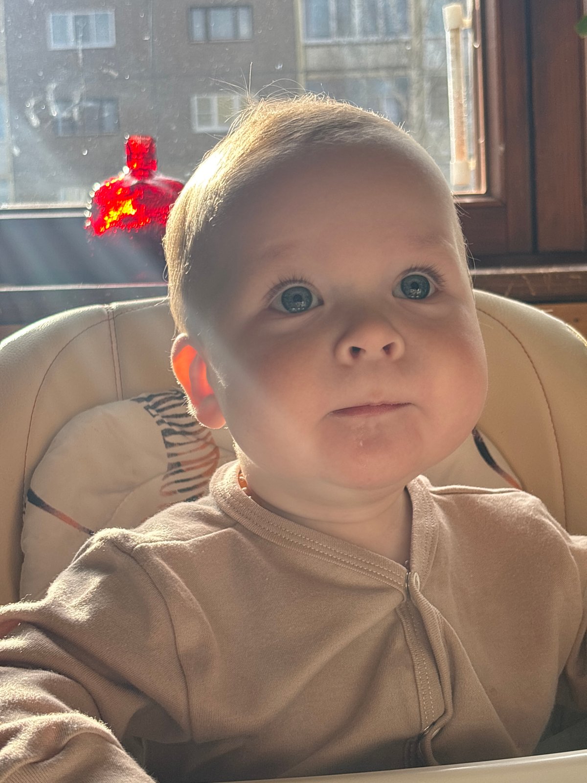 Baby photographed multiple times in Марковský, Russia courtyard area