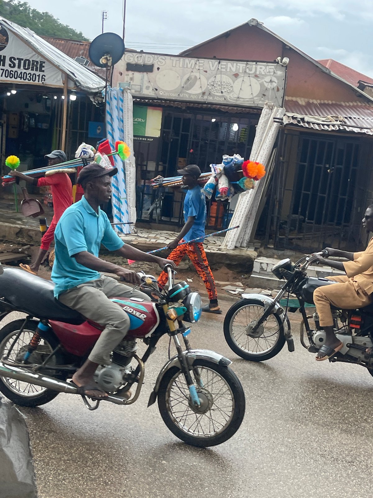Street life documented in Abuja commercial district over 10 minutes