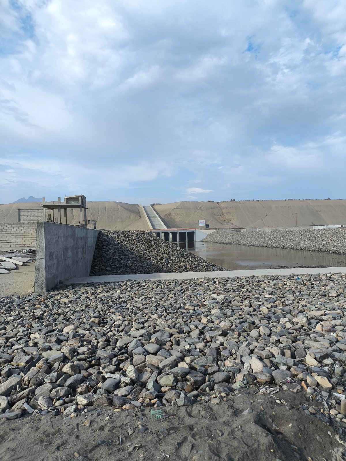 Coastal concrete infrastructure observed under clear skies