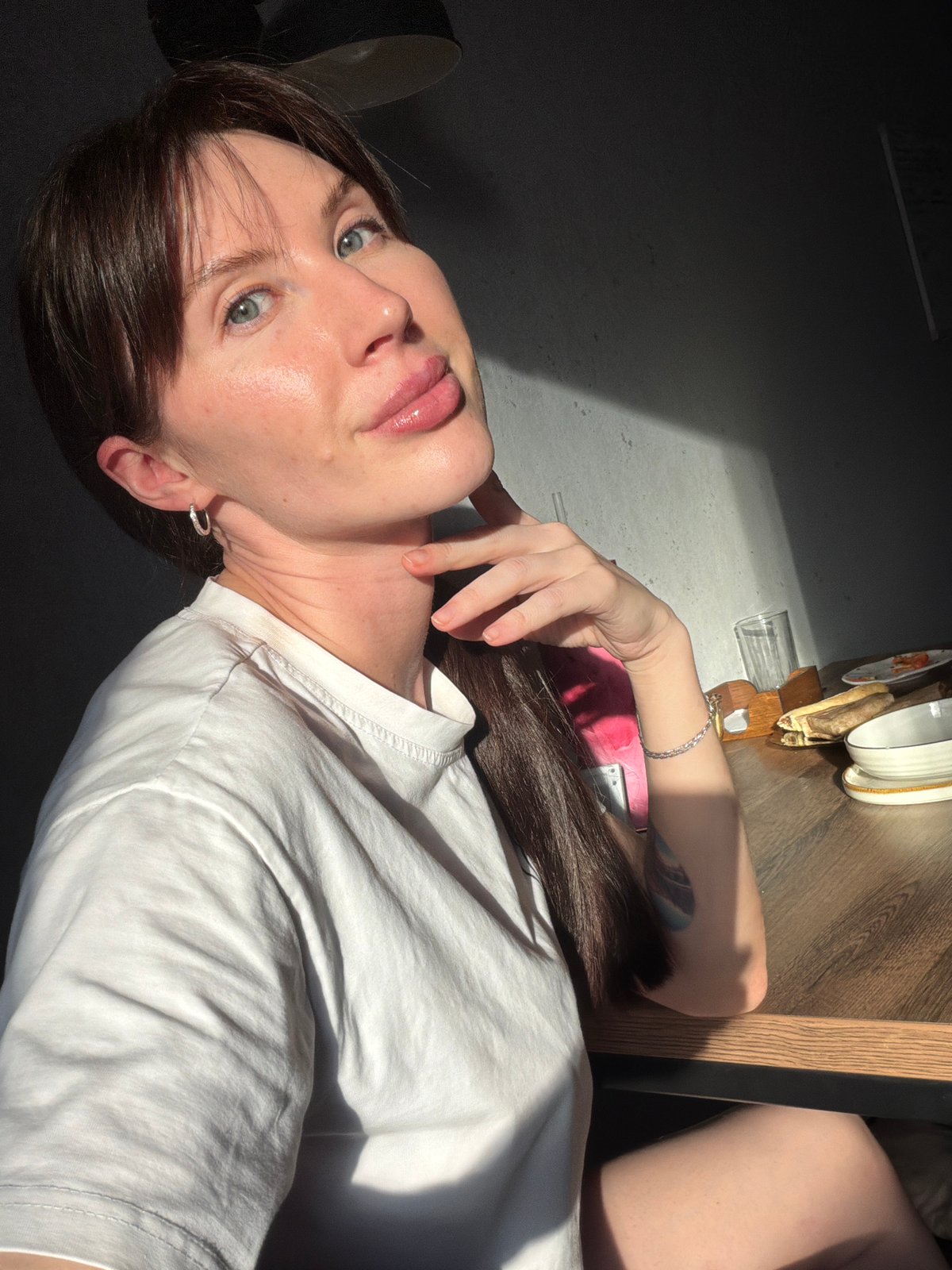 Woman photographed relaxing indoors in Perm, Russia