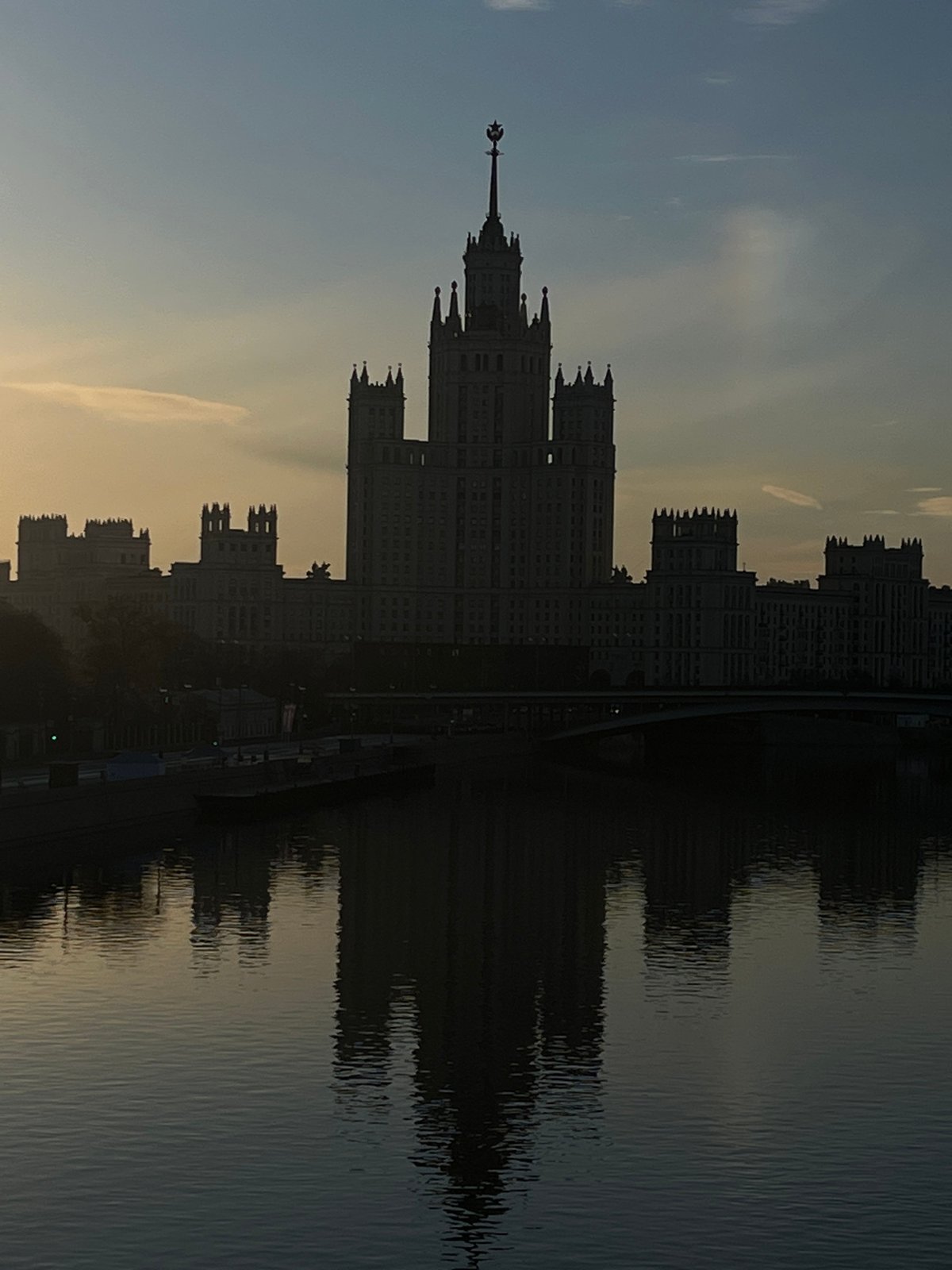 Moscow landmarks reflected in Moskva River during early morning