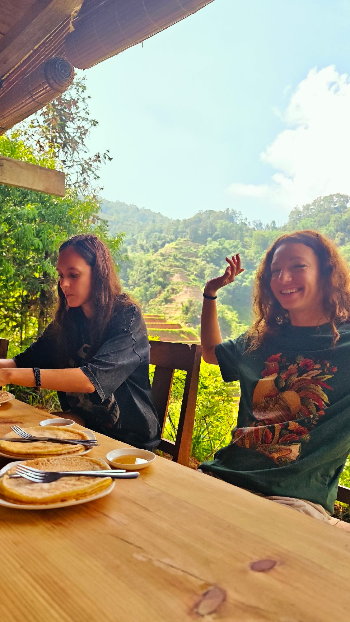 Tourists dine overlooking rice terraces in northern Vietnam