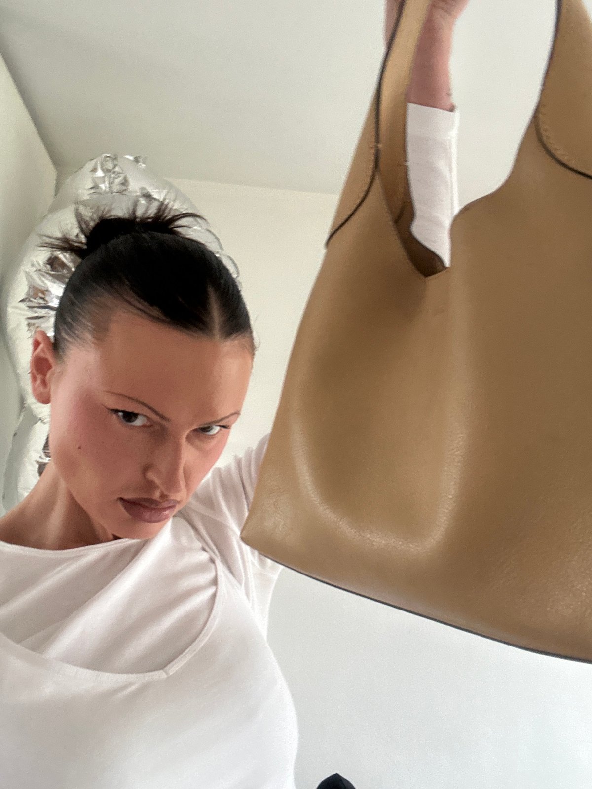 Woman documents complete morning beauty routine in detailed selfie sequence