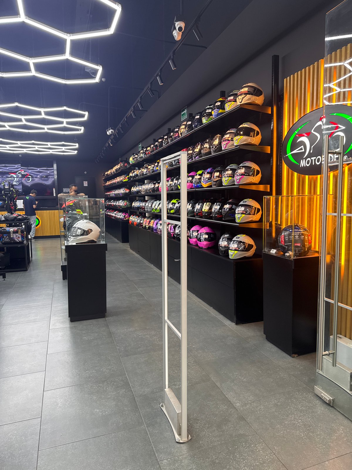 Buddha statue observed in motorcycle helmet shop in Puebla