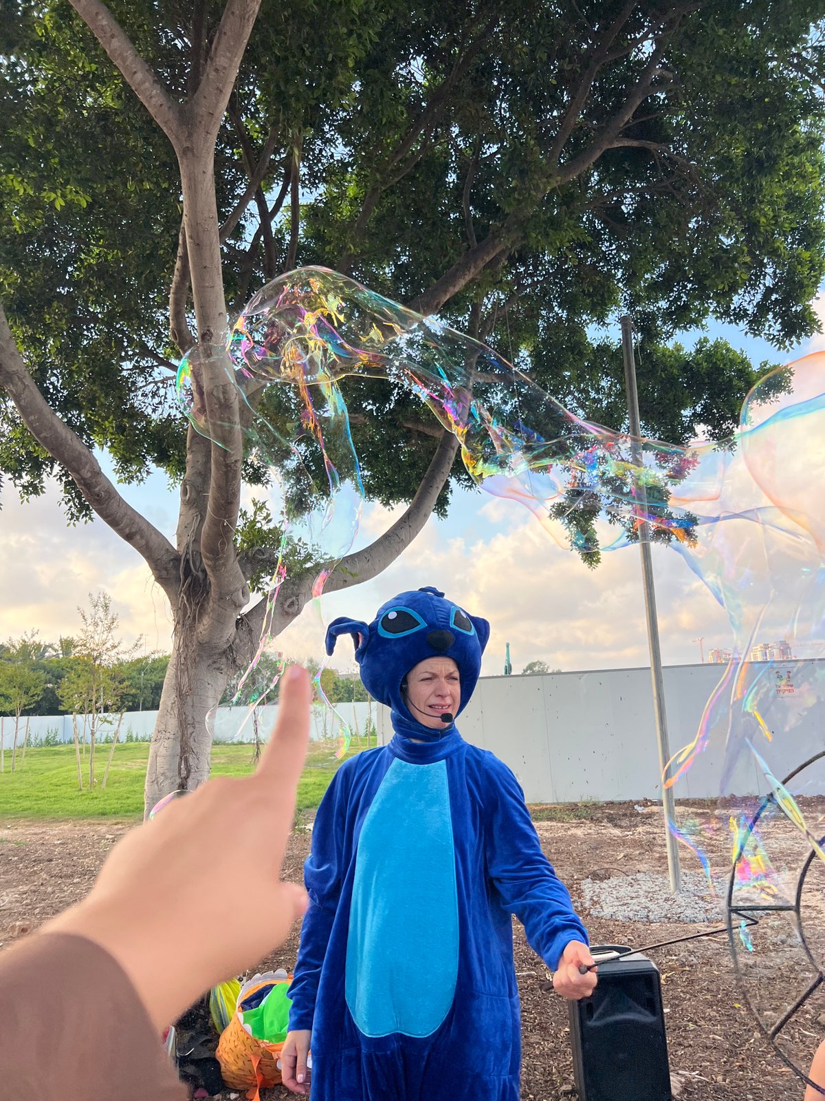 Stitch costume character runs a bubble show in Kiryat Bialik