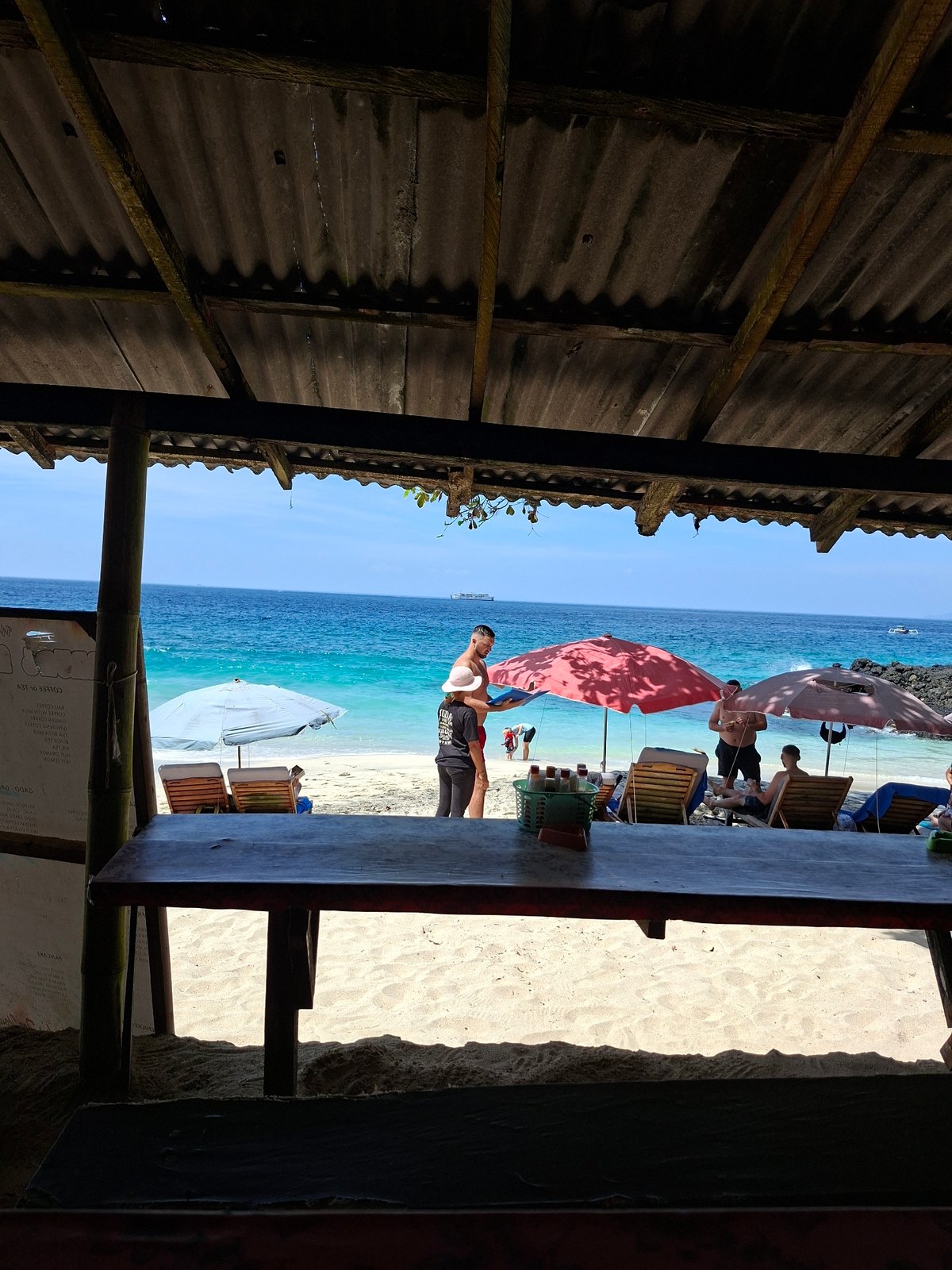 Beachside meal documented at rustic cafe in Manggis, Indonesia