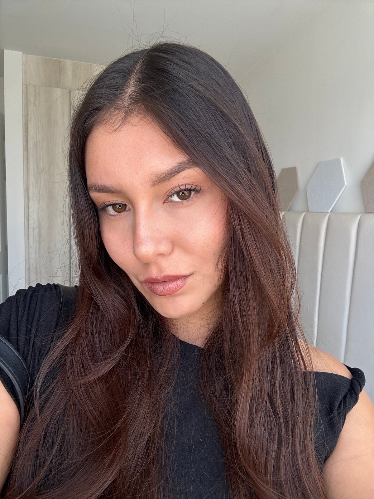 Woman takes selfies indoors in San Francisco Ocotlán