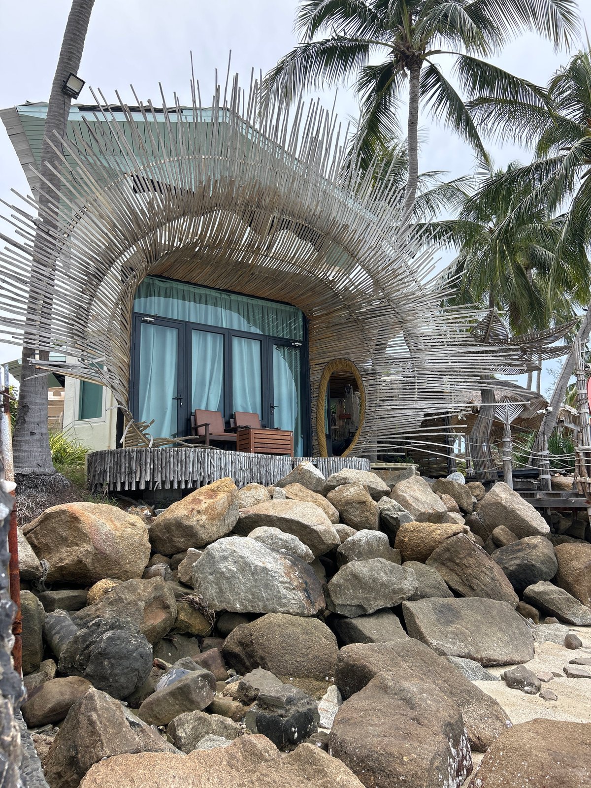 Low tide exploration along a rocky Ban Tai beach
