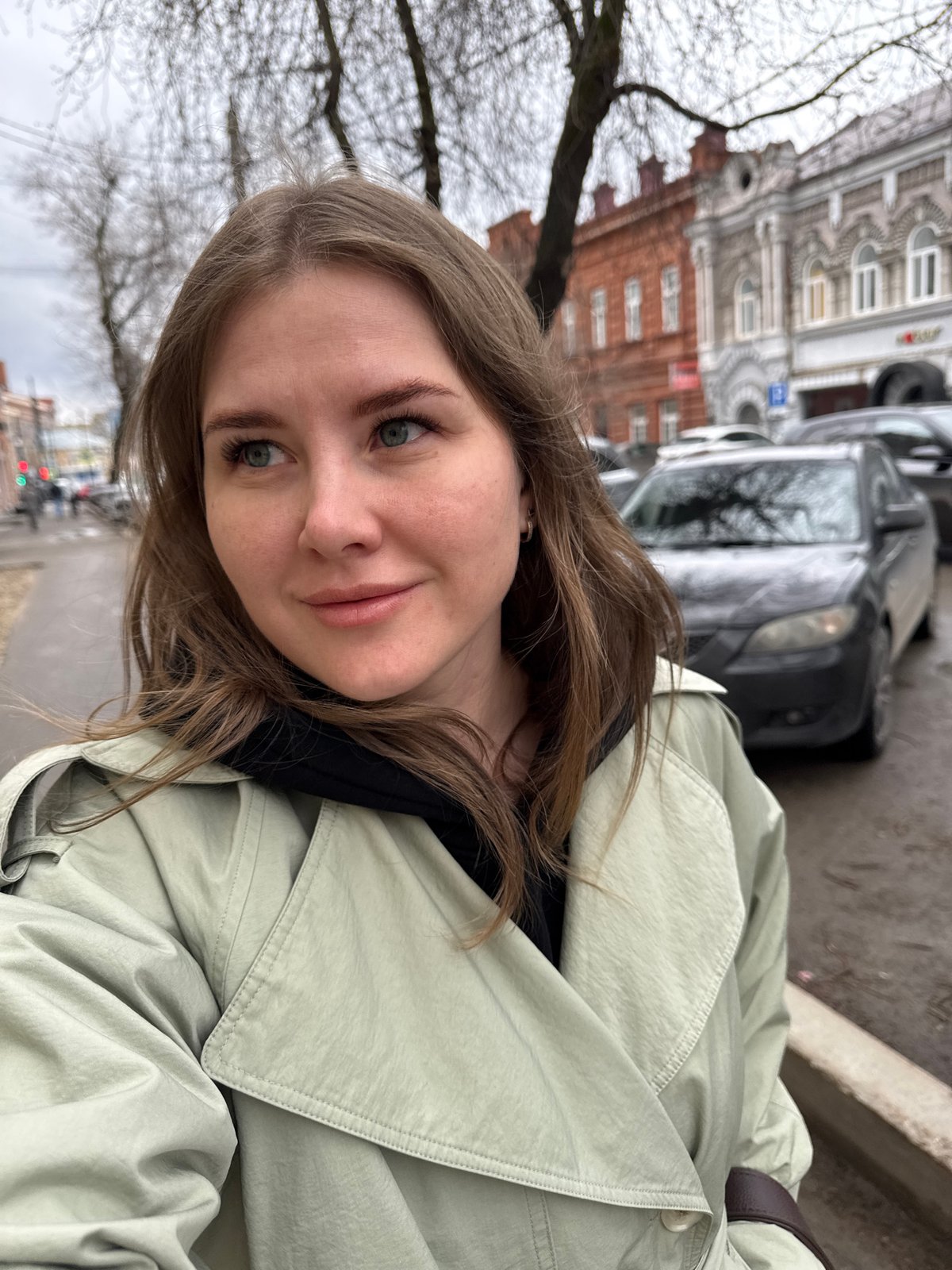 Tourist documents morning walk through Perm shopping district