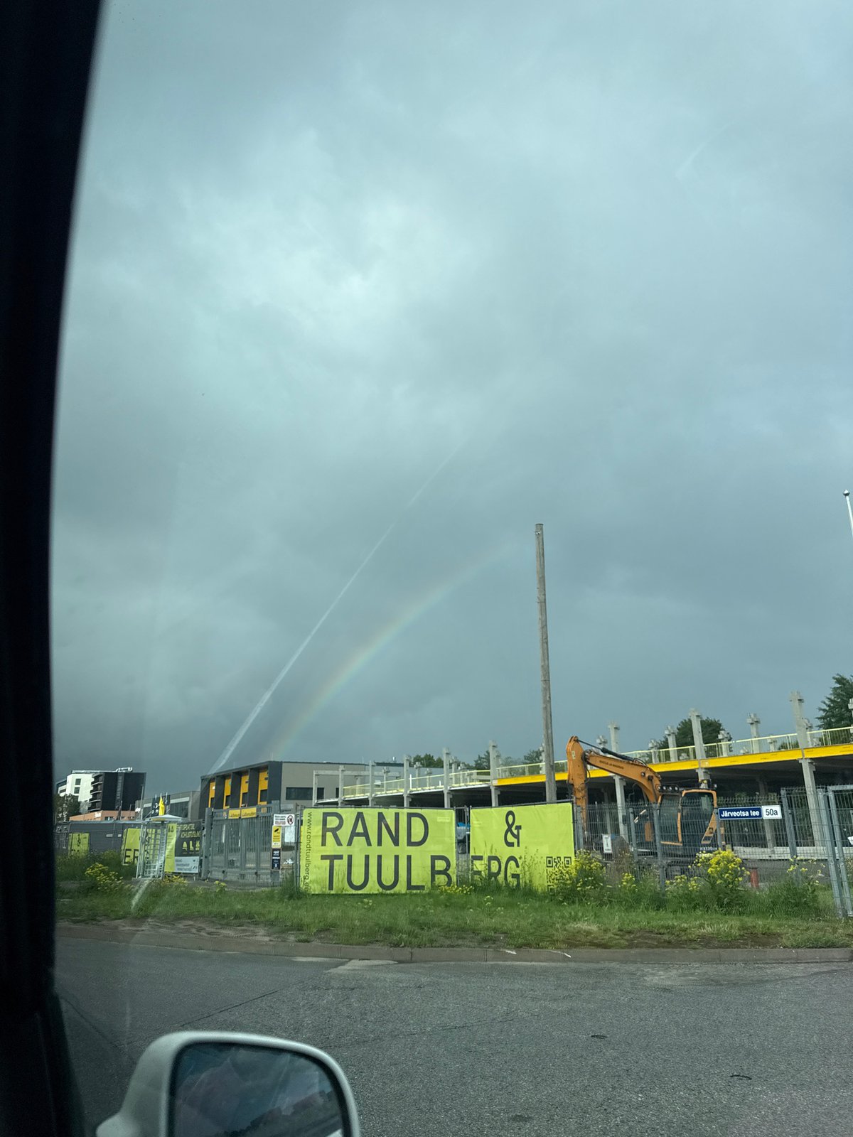 Rainbow over Tallinn captured from multiple city locations