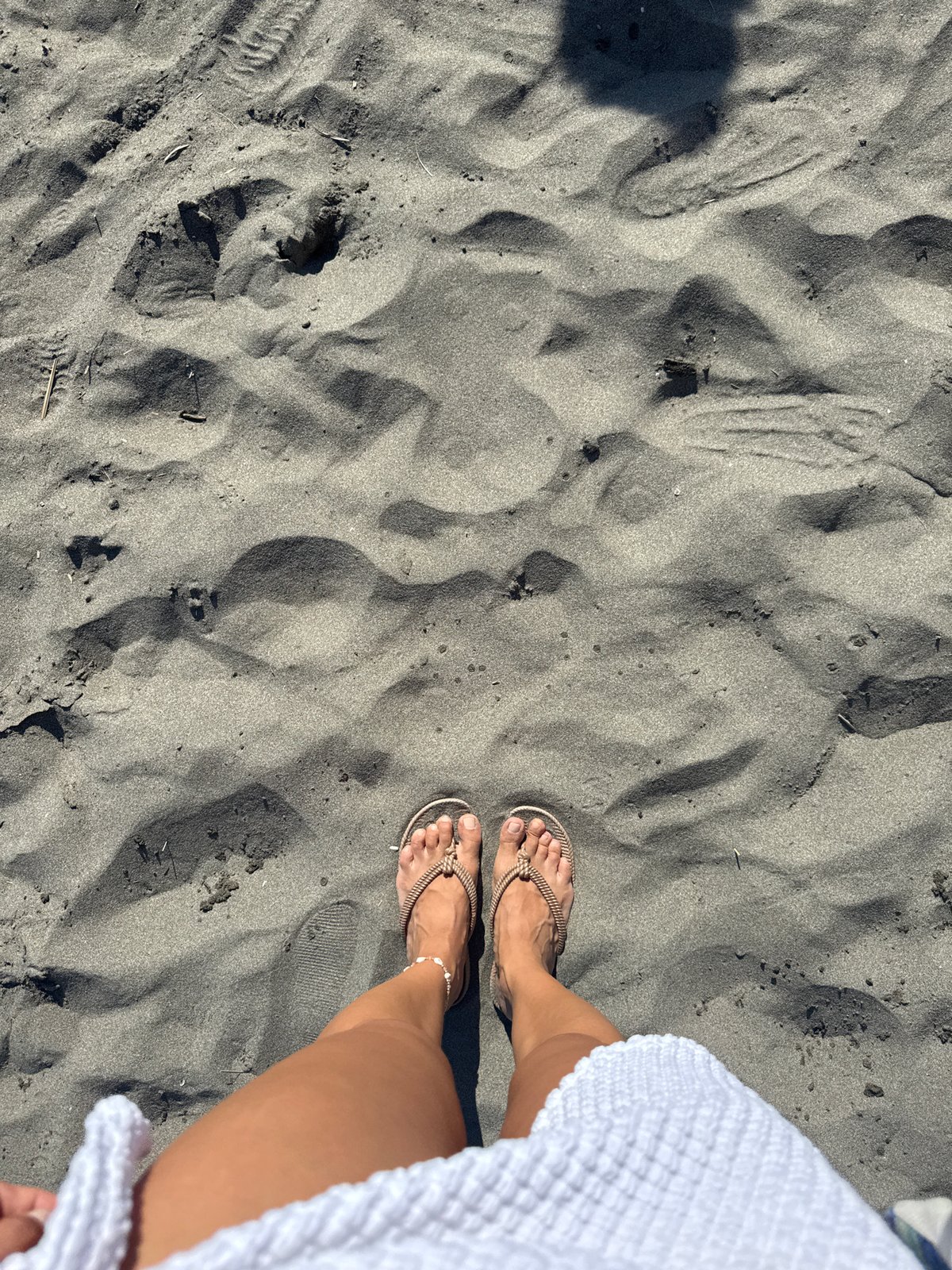 Calm beach day in Montenegro, with a Santa hat surprise