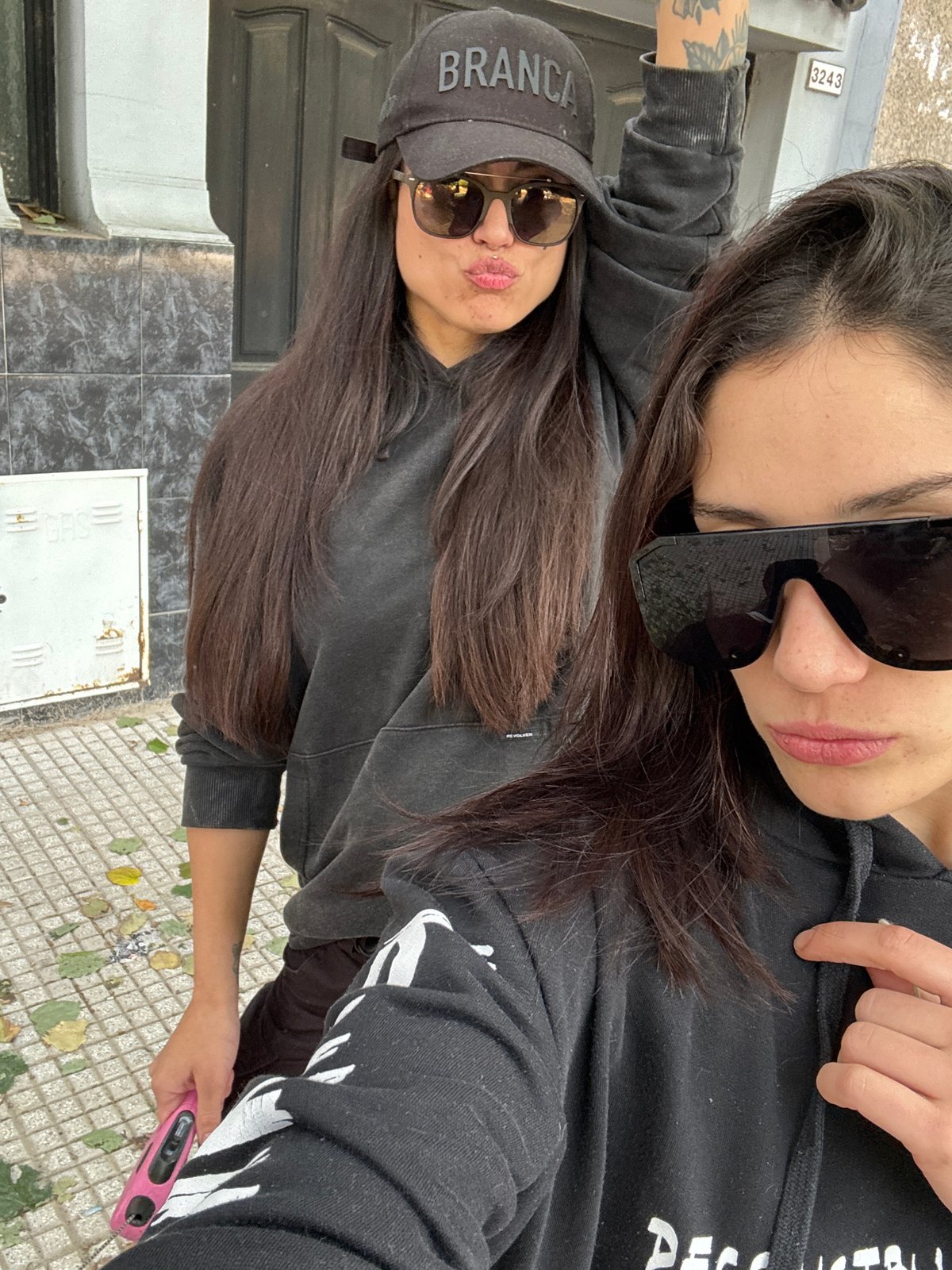 Women take selfies, dog walker spotted on Buenos Aires street