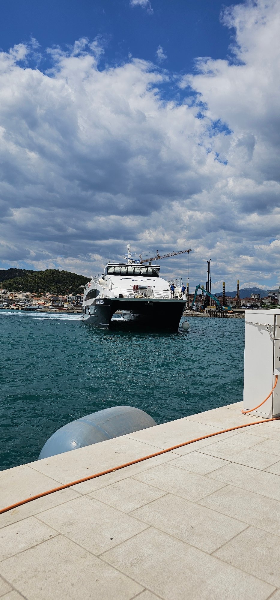 Ferries at the Split waterfront on a busy July morning