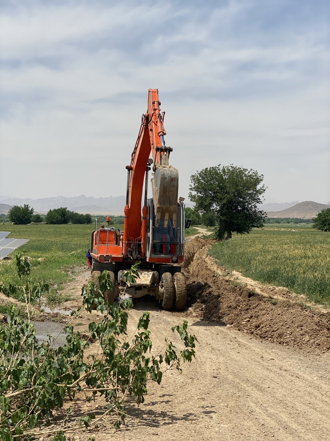 Rural construction work and daily life captured in Ashoqah, Afghanistan